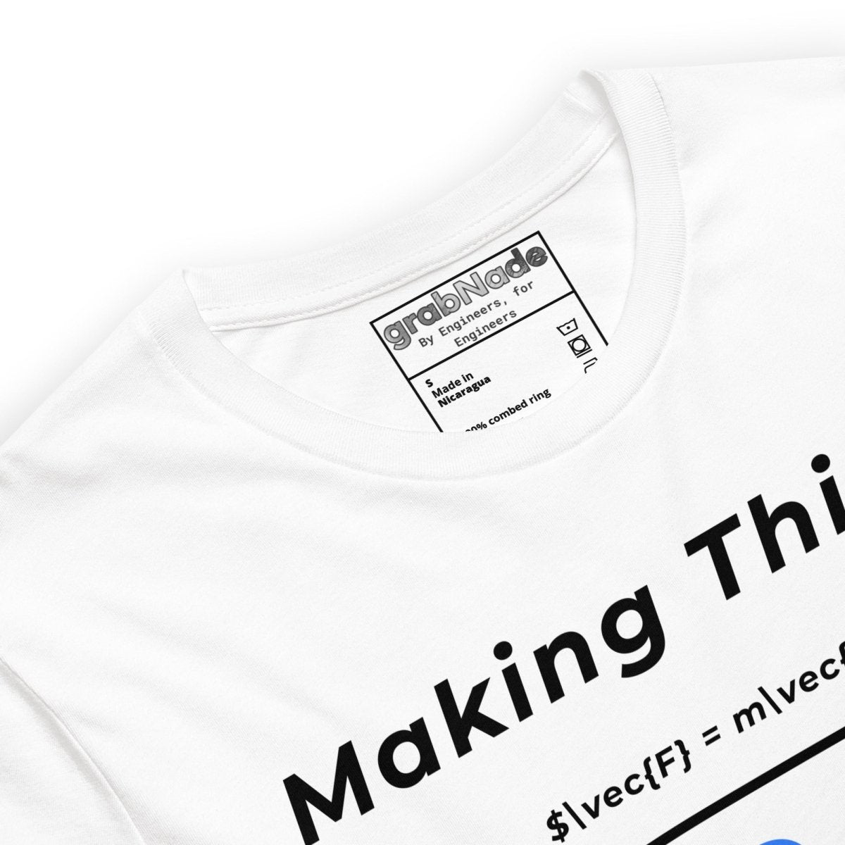 Close up of white t-shirt "Making Things MOVE" with $\vec{F}=m\vec{a}$ vector arrow physics equation.