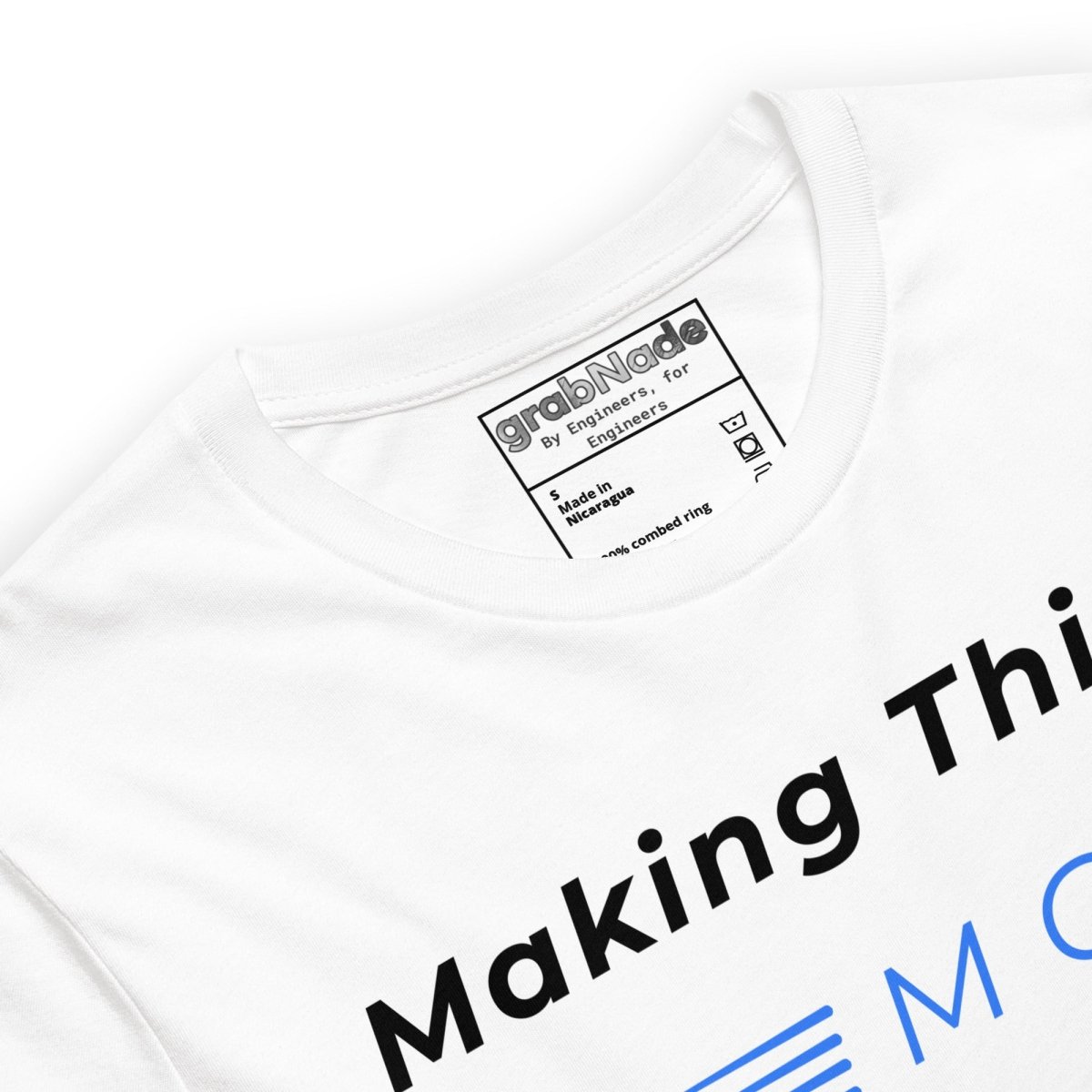 Close up of white t-shirt with "Making Things MOVE" text and dynamic blue velocity lines graphic.