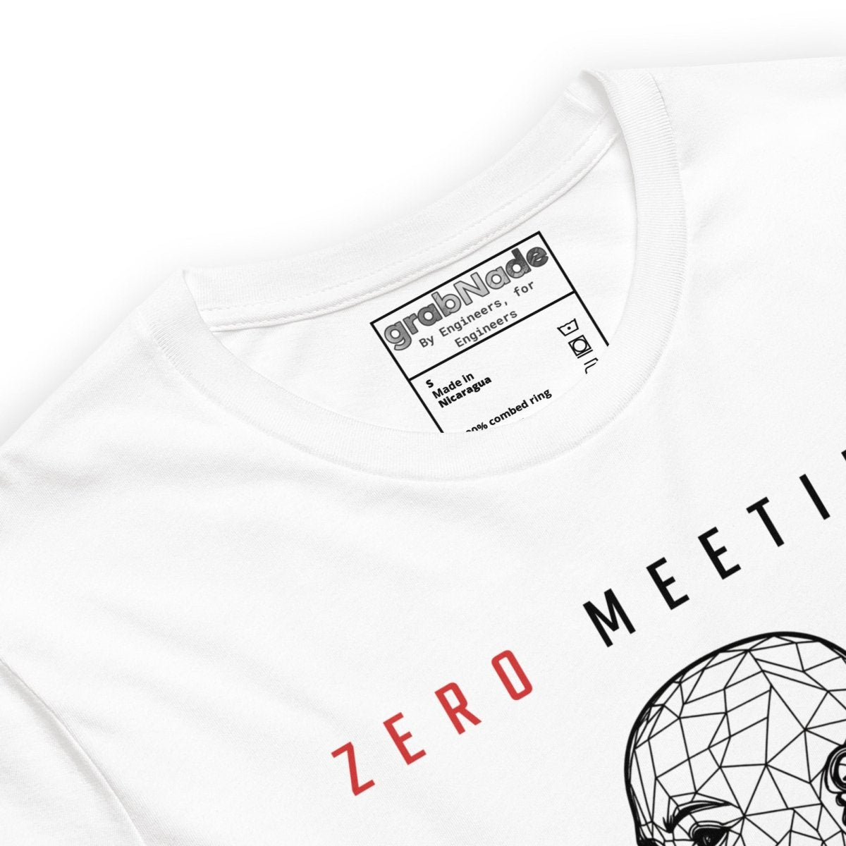 Close up of white t-shirt with wireframe head and "Zero Meetings Maximum Output" productivity text.