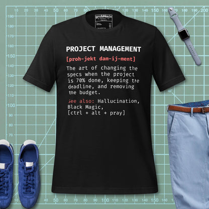 Black t-shirt "Project Management [proh-jekt dam-ij-ment] ctrl+alt+pray" definition.