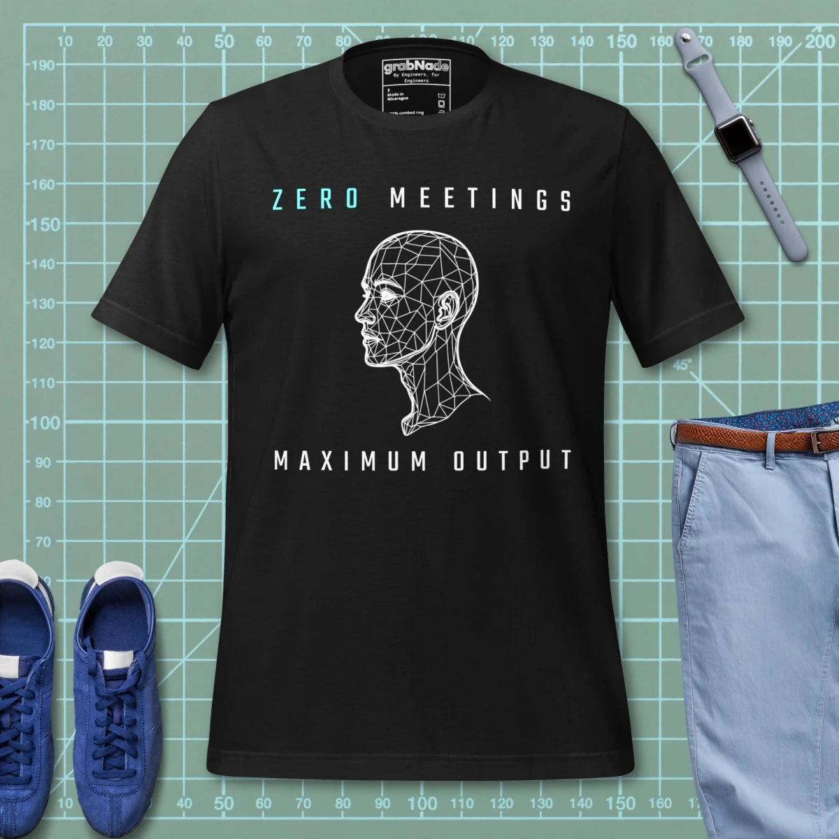 Black t-shirt with wireframe head and "Zero Meetings Maximum Output" productivity text. FEA Eng.