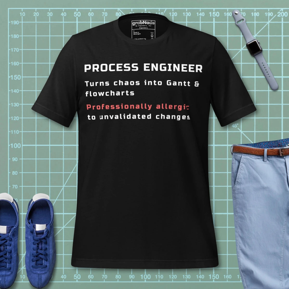 Black t-shirt with "Process Engineer. Turns chaos into Gantt & flowcharts" definition text.
