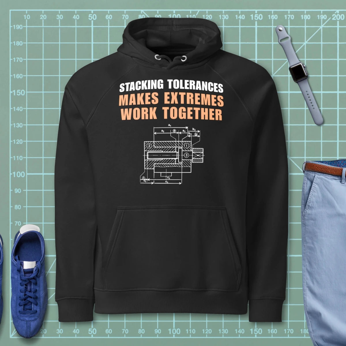 Black eco raglan hoodie featuring a CAD blueprint graphic and stacking tolerances text for engineers.