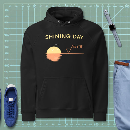 Black hoodie featuring an Ra0.02 surface finish symbol on a geometric sunset horizon line.