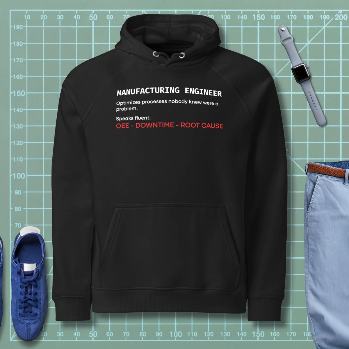Black hoodie with "Manufacturing Engineer" definition featuring OEE and root cause terminology.