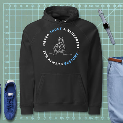 Black organic hoodie with wireframe woman and "Never Trust a Blueprint It's Always Sketchy" text.