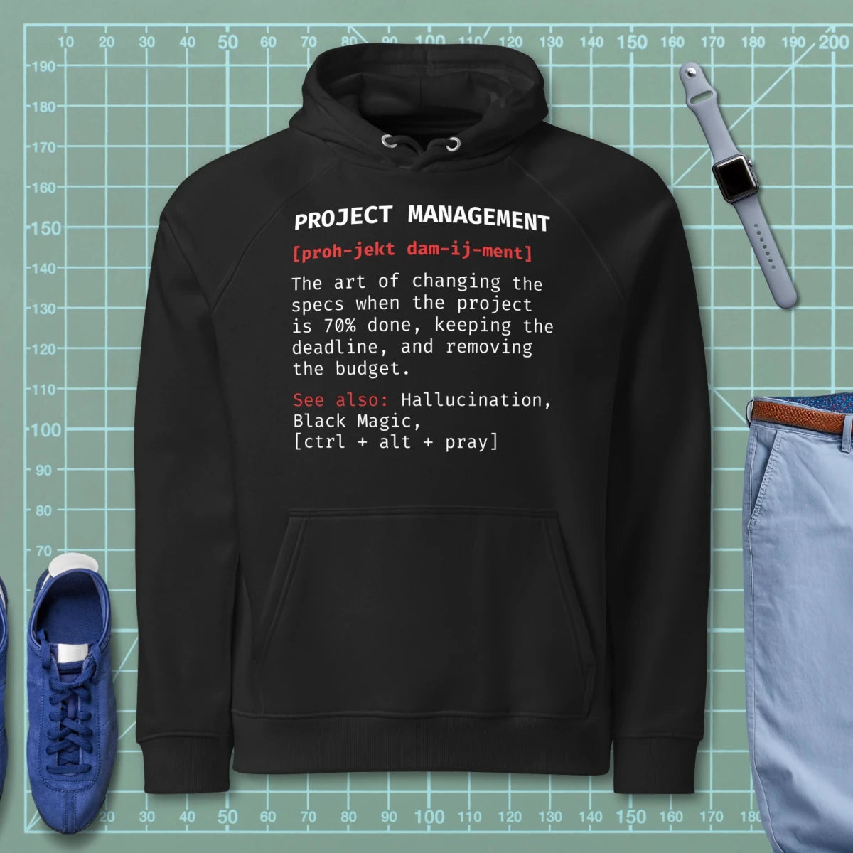 Black hoodie "Project Management [proh-jekt dam-ij-ment] ctrl+alt+pray" definition.