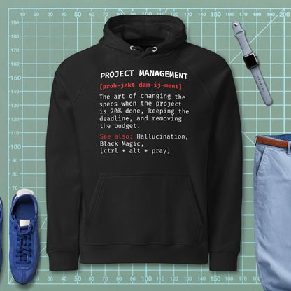 Black hoodie "Project Management [proh-jekt dam-ij-ment] ctrl+alt+pray" definition.