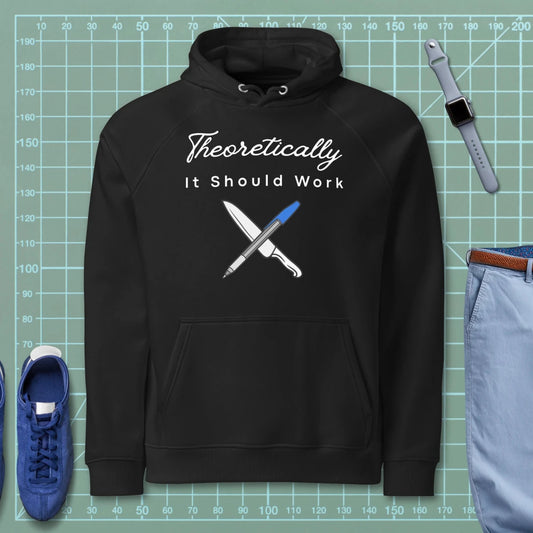 Black hoodie "Theoretically it should work" with crossed blueprint pen and knife graphic.