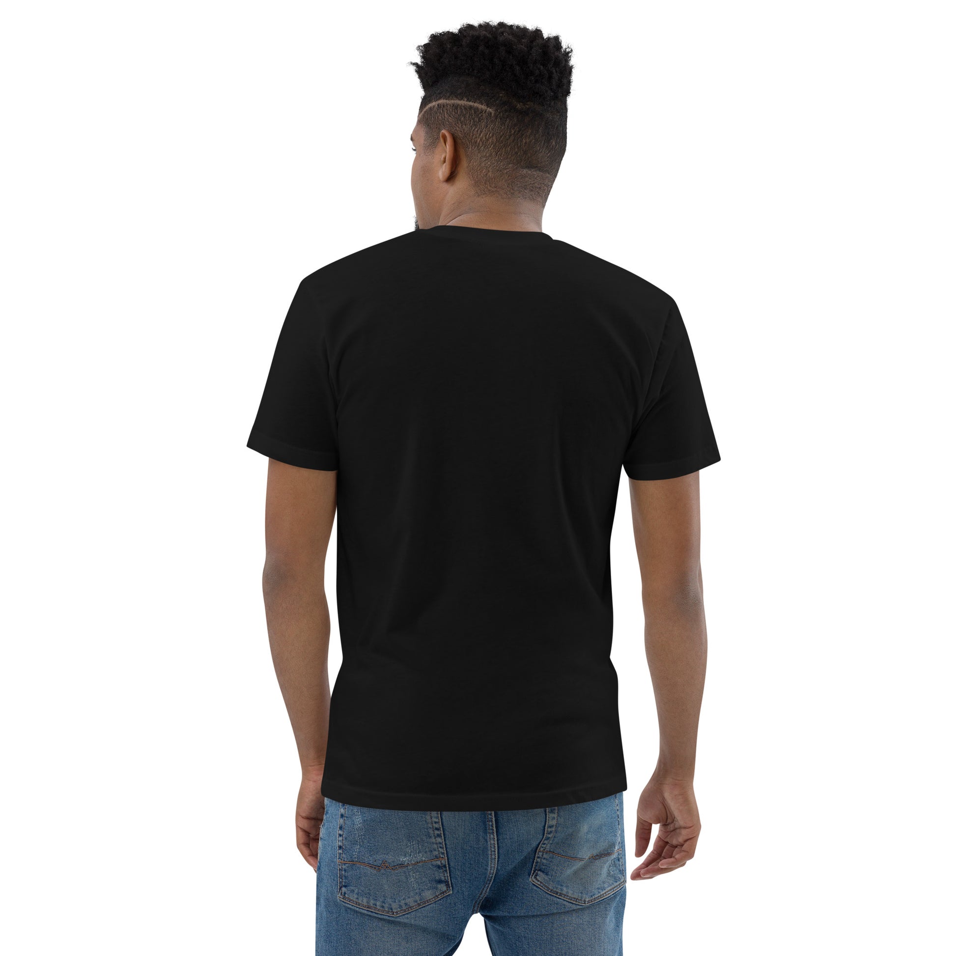 Product mockup. Man with short curly hair wearing a plain black fitted t-shirt and blue jeans, back view.