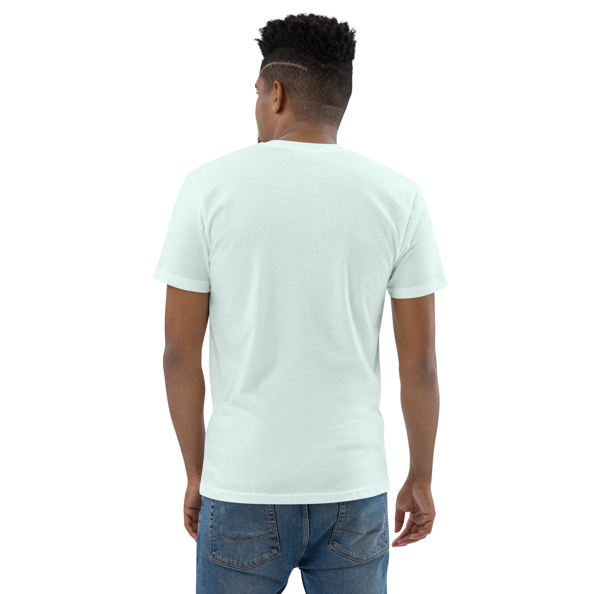 Product mockup. Man with short curly hair wearing a plain light blue fitted t-shirt and blue jeans, back view.