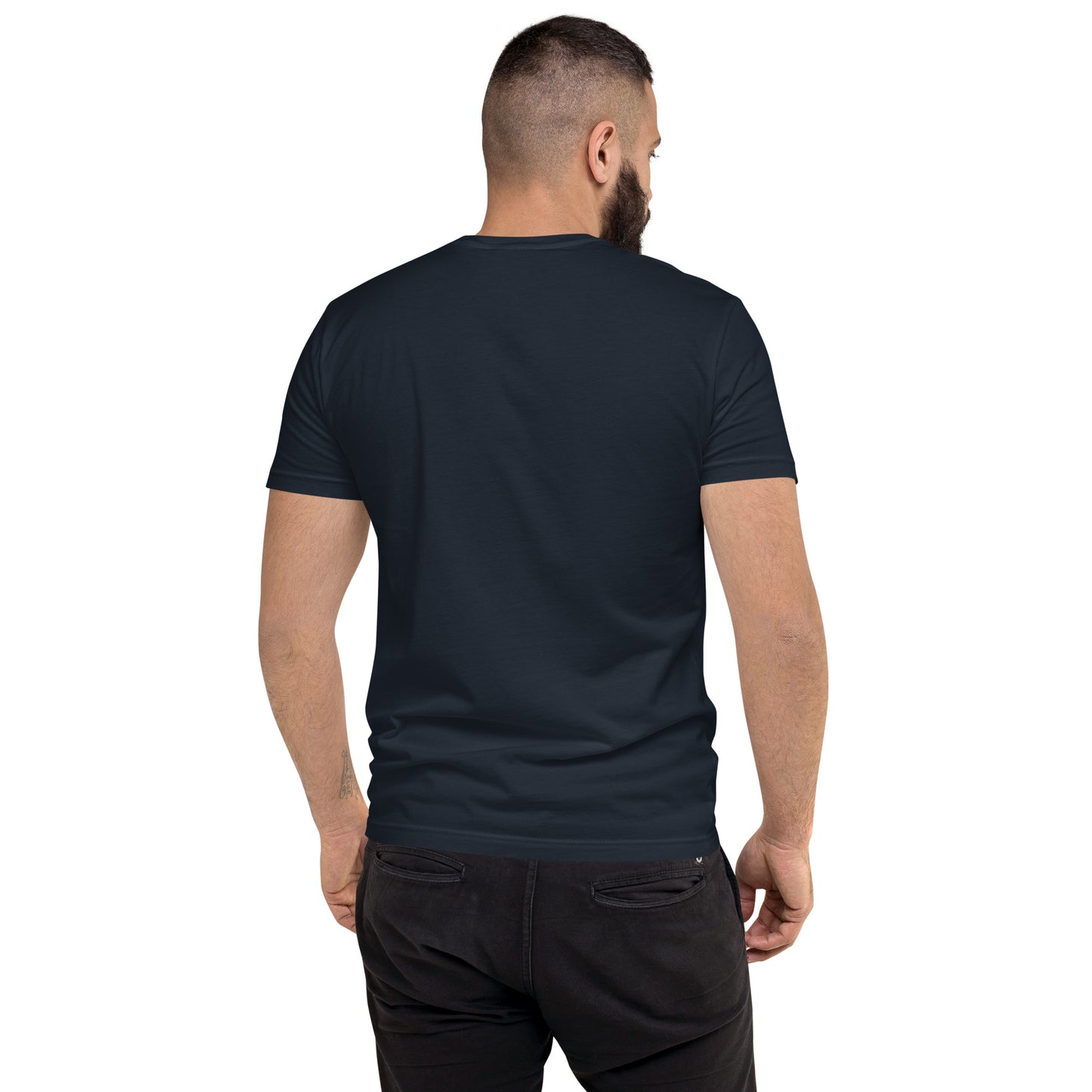 Product mockup. Man with short curly hair wearing a plain midnight navy t-shirt and blue jeans, back view.