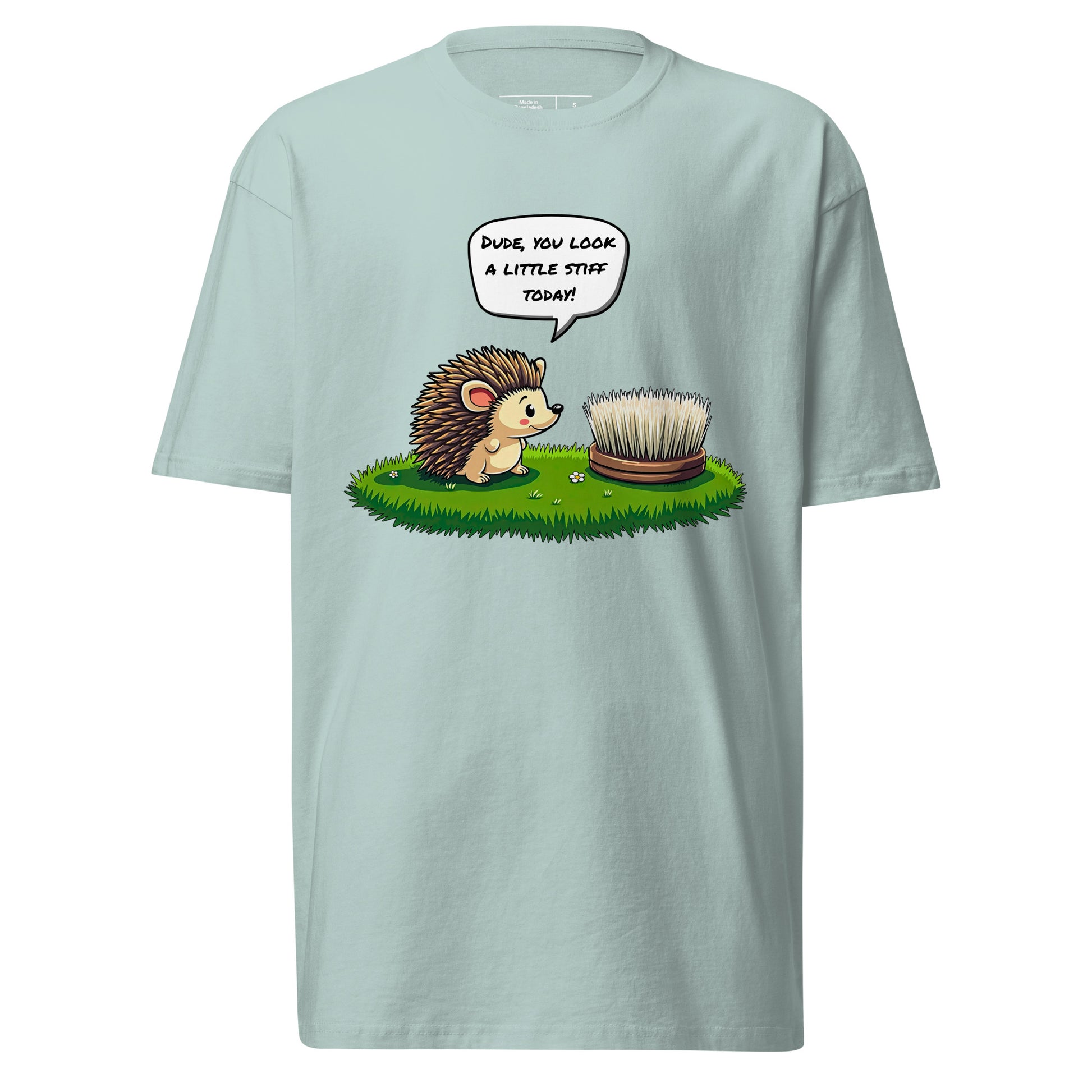 The grabNade Men's Relaxed Heavyweight Tee features premium cotton and a light blue cartoon of a hedgehog with a hairbrush, captioned "Dude you look a little stiff today"—a modern fit for those who love clever, playful humor.