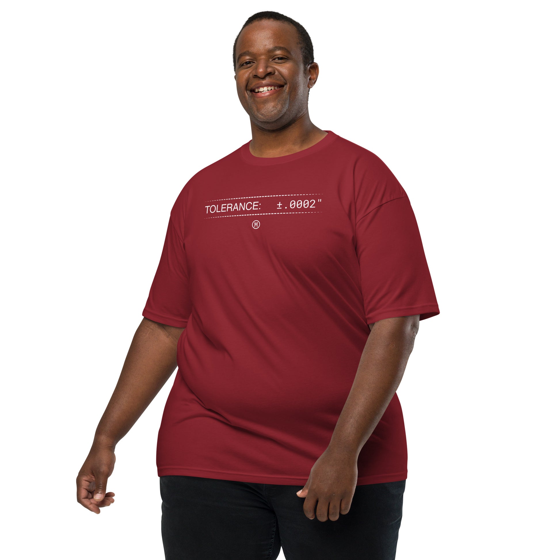 2XL man in heavyweight red premium t-shirt with white text "TOLERANCE: ±.0002" for mechanical engineers.