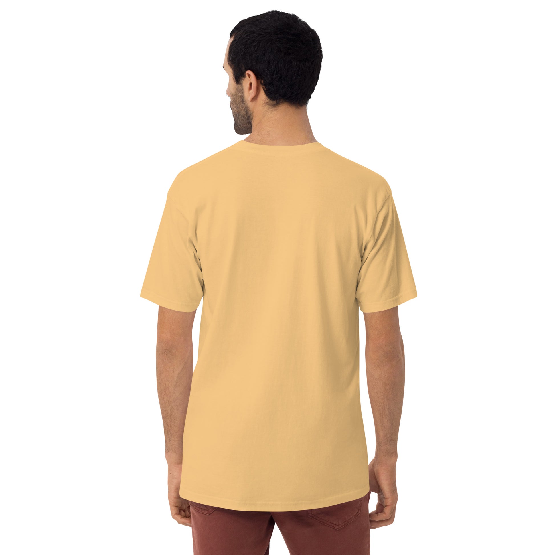 Product mockup. Plus-size man shown from behind, wearing a plain pale yellow t-shirt and dark pants.