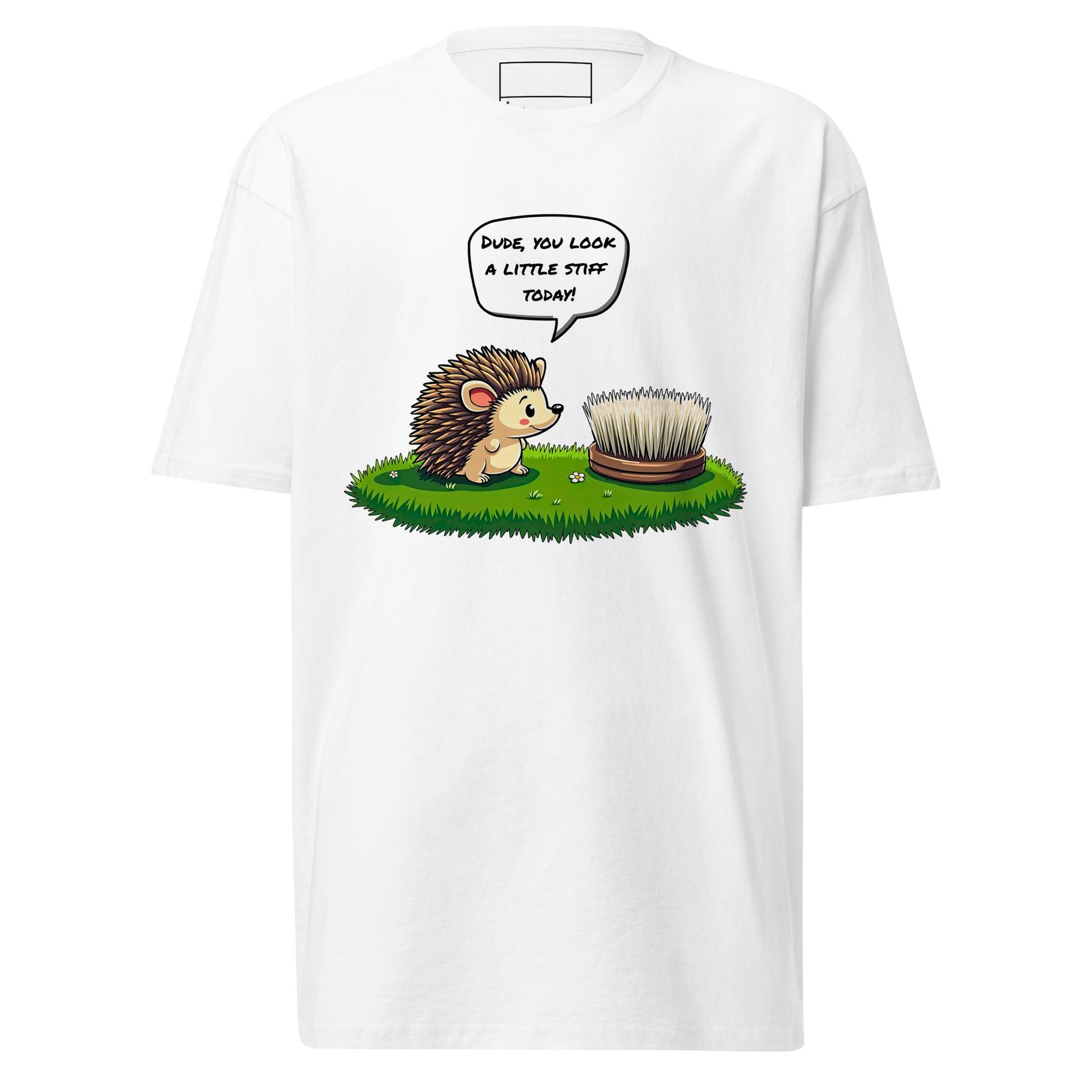 The grabNade Men's Relaxed Heavyweight Tee in premium cotton features a cartoon hedgehog on grass joking, "Dude you look a little stiff today," combining comfort and playful design for a modern look.