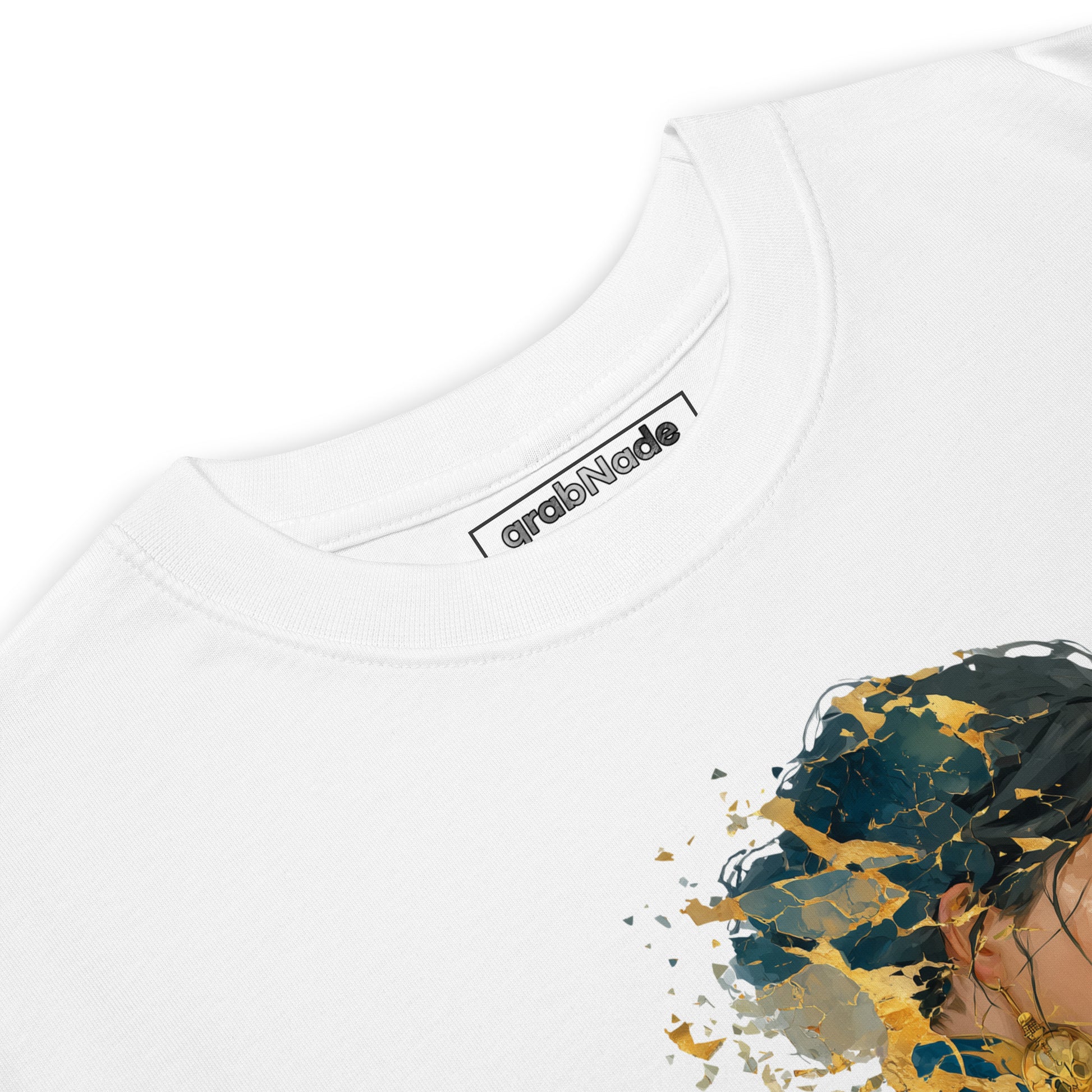 Product mockup. Closeup of the neck and collar label of a white t-shirt showing the grabNade brand and part of a large colorful smiley face with rainbow stripes.