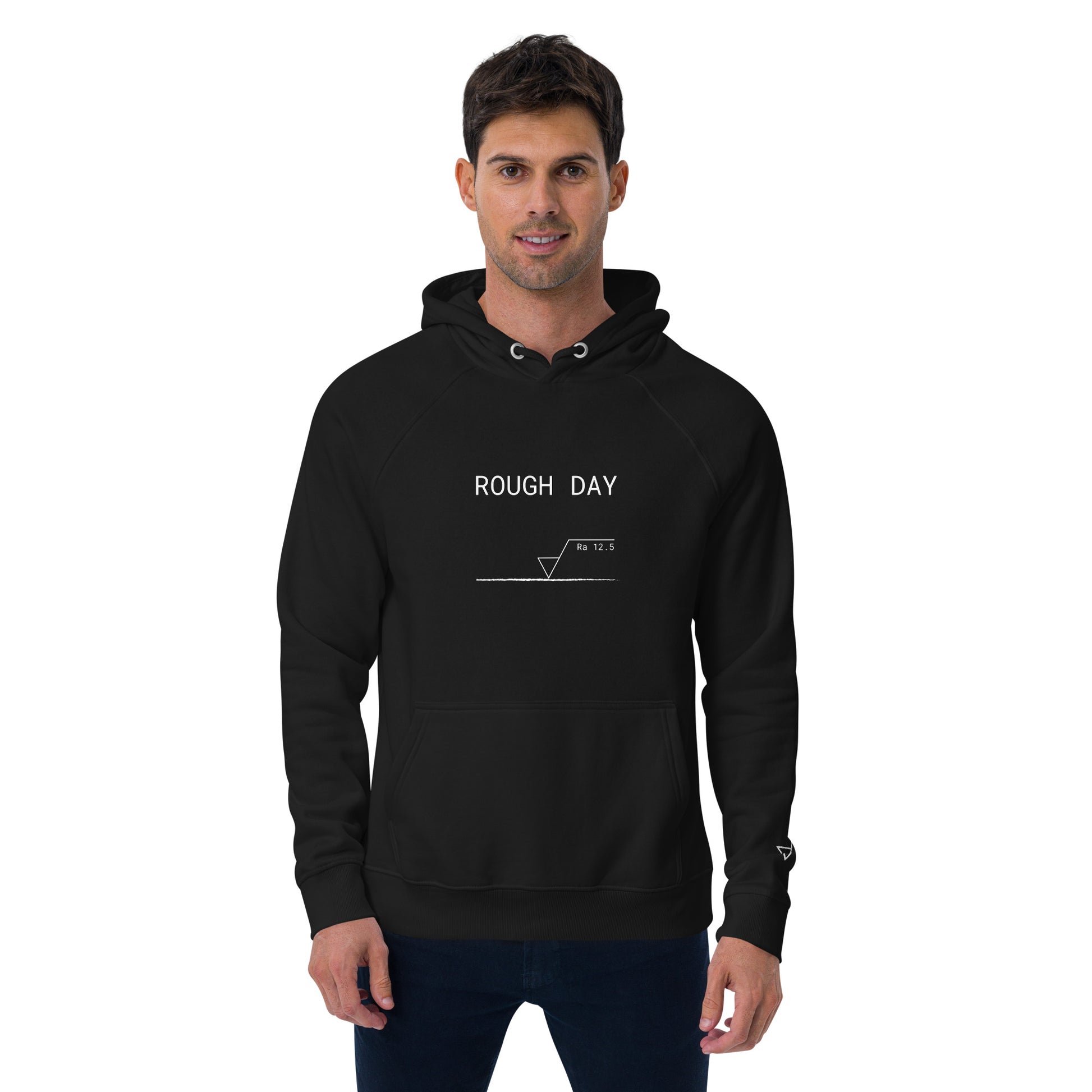 Man in black GOTS organic premium hoodie with white roughness symbol and "ROUGH DAY (Ra 12.5)" text.