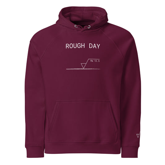 Red GOTS organic premium hoodie with white roughness symbol and "ROUGH DAY (Ra 12.5)" text.
