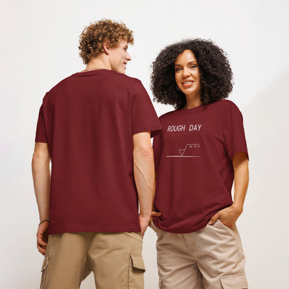 Man seen from behind and woman facing forward wearing red GOTS organic tee with white roughness symbol and "ROUGH DAY (Ra 12.5)" text.