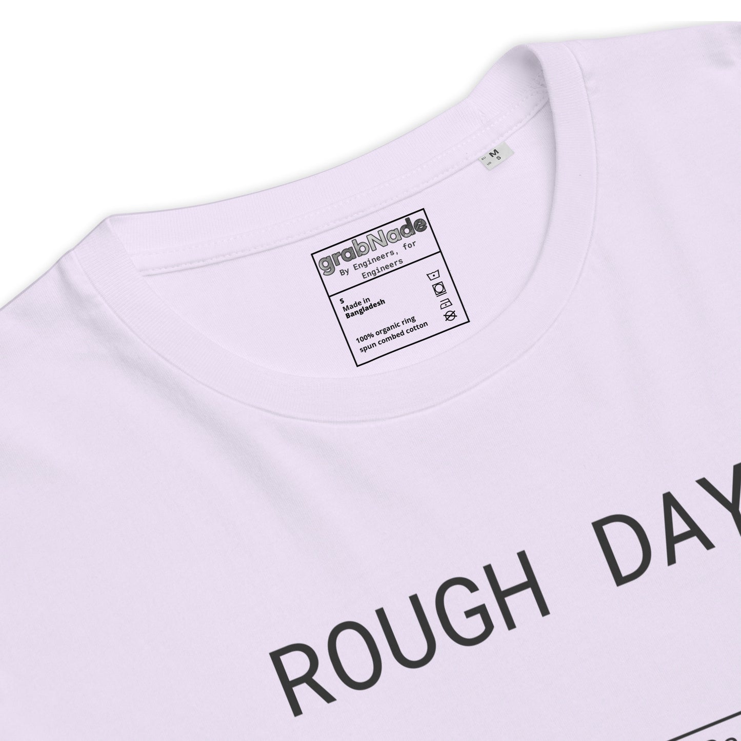 Closeup of lavender GOTS organic tee with roughness symbol and "ROUGH DAY (Ra 12.5)" text.