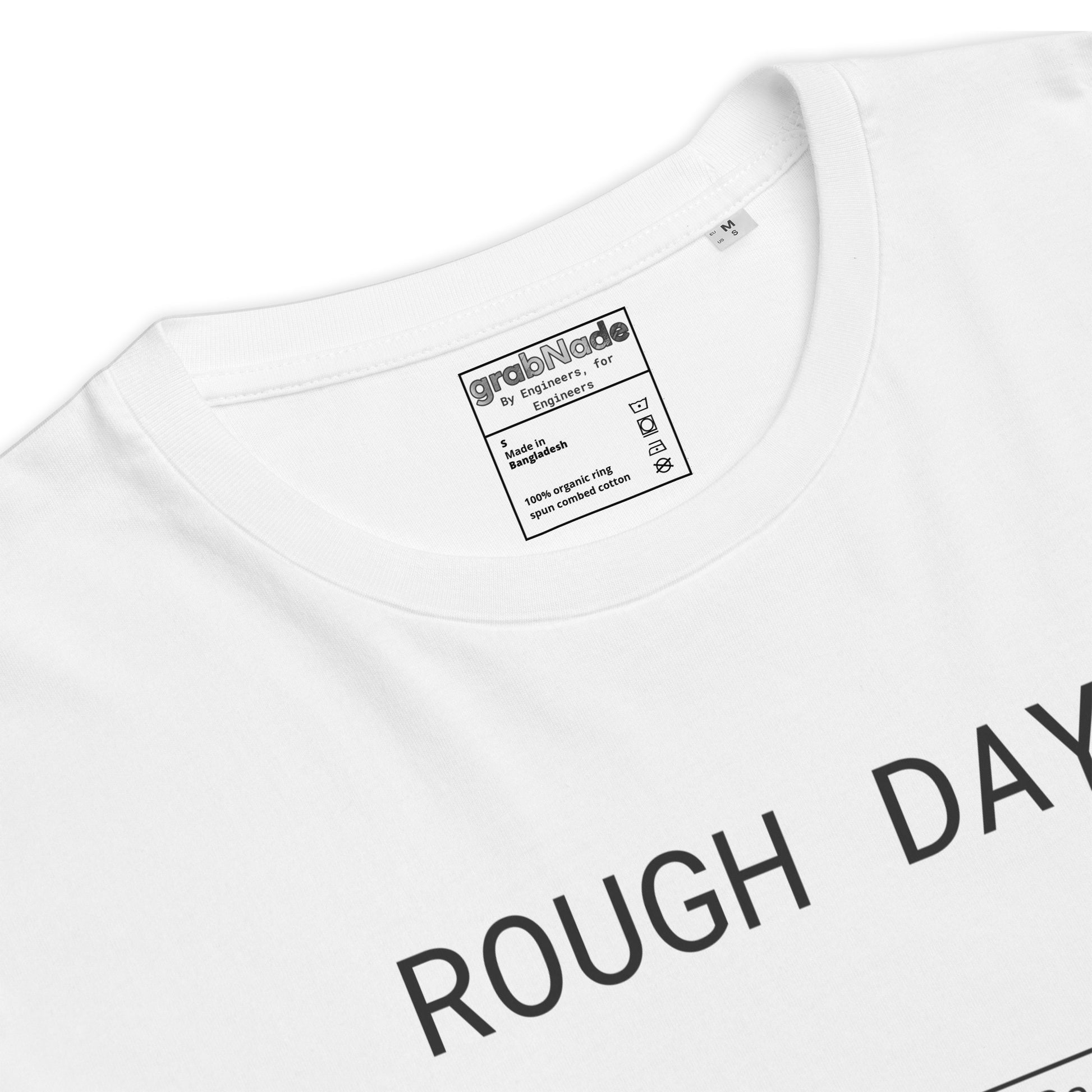Closeup of with GOTS organic tee with roughness symbol and "ROUGH DAY (Ra 12.5)" text.