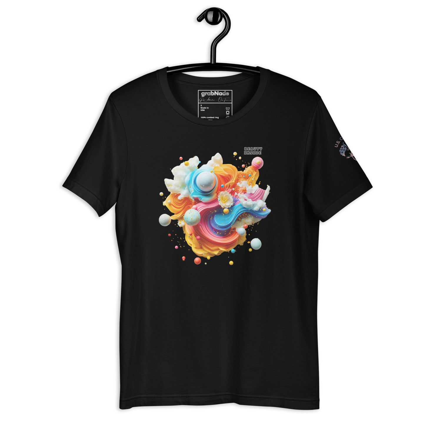 Product mockup. Black t-shirt on a hanger with a multicolored abstract swirl of clouds and planets in pastel shades of blue, pink, orange, and white.