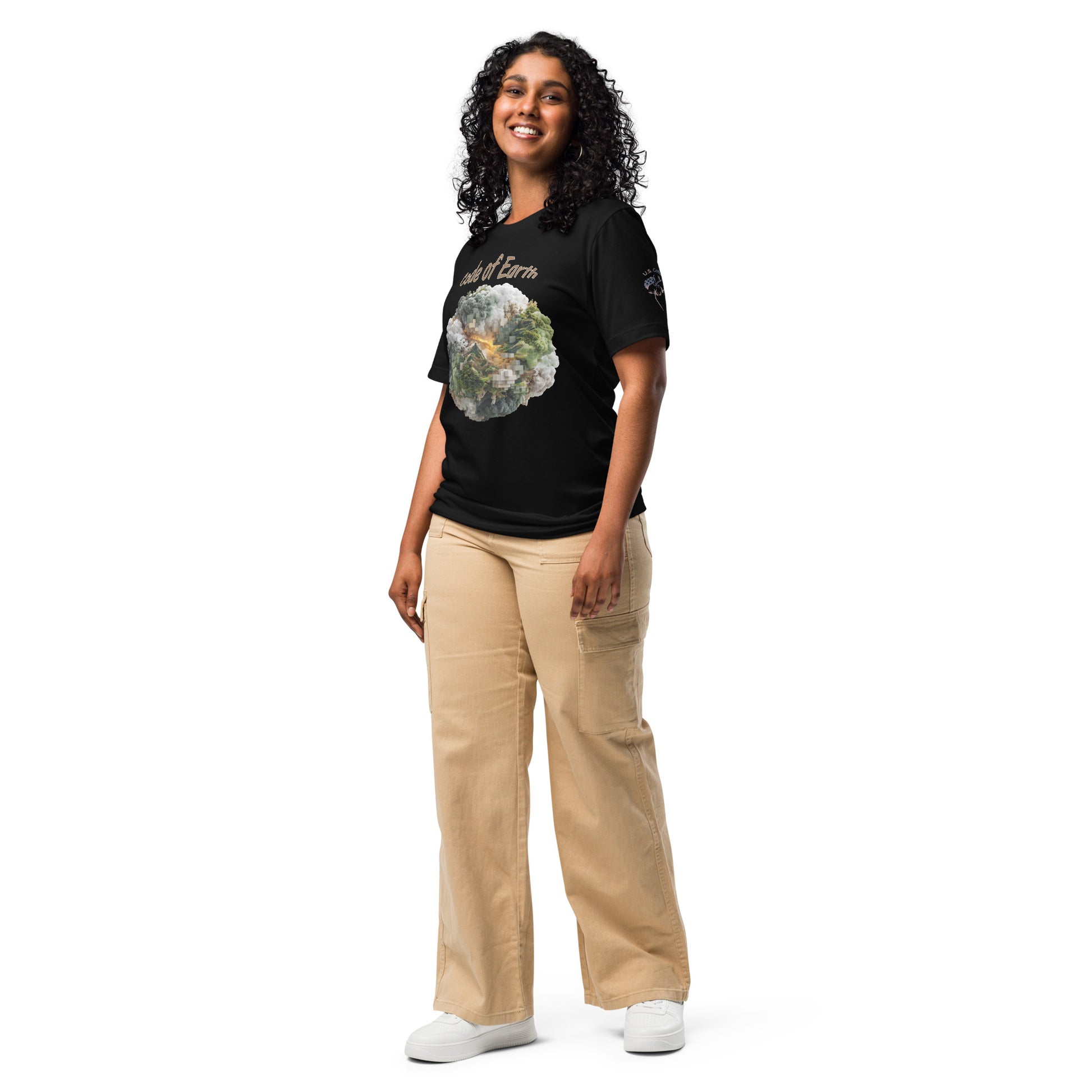 Product mockup. A woman wears a black t-shirt with a cloud-like, digital forest illustration and "code of Earth" text, plus a "U.S. Cotton" badge on the left sleeve.