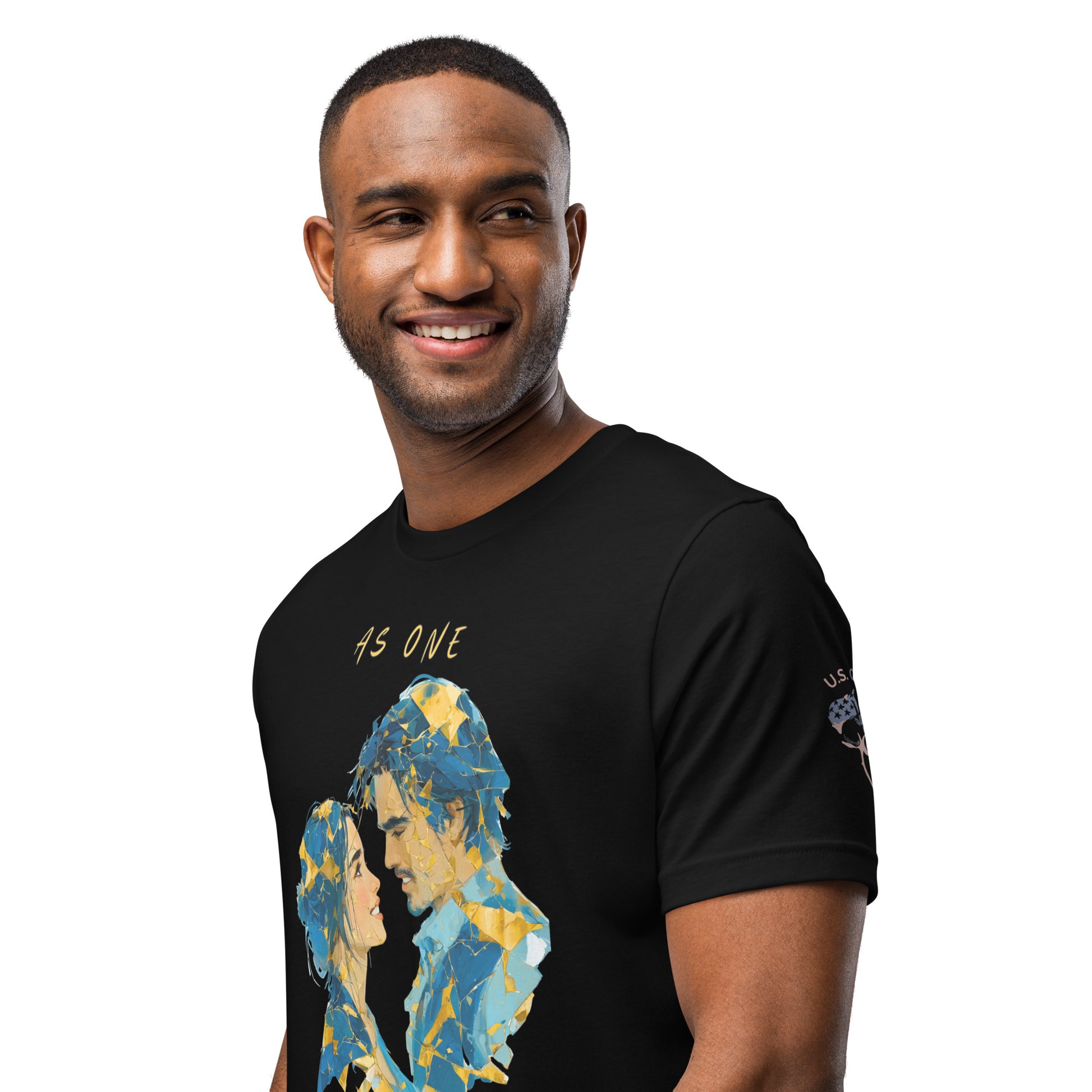 Product mockup. A man wears a black t-shirt with an abstract blue and yellow portrait of two faces and the phrase "AS ONE" above.
