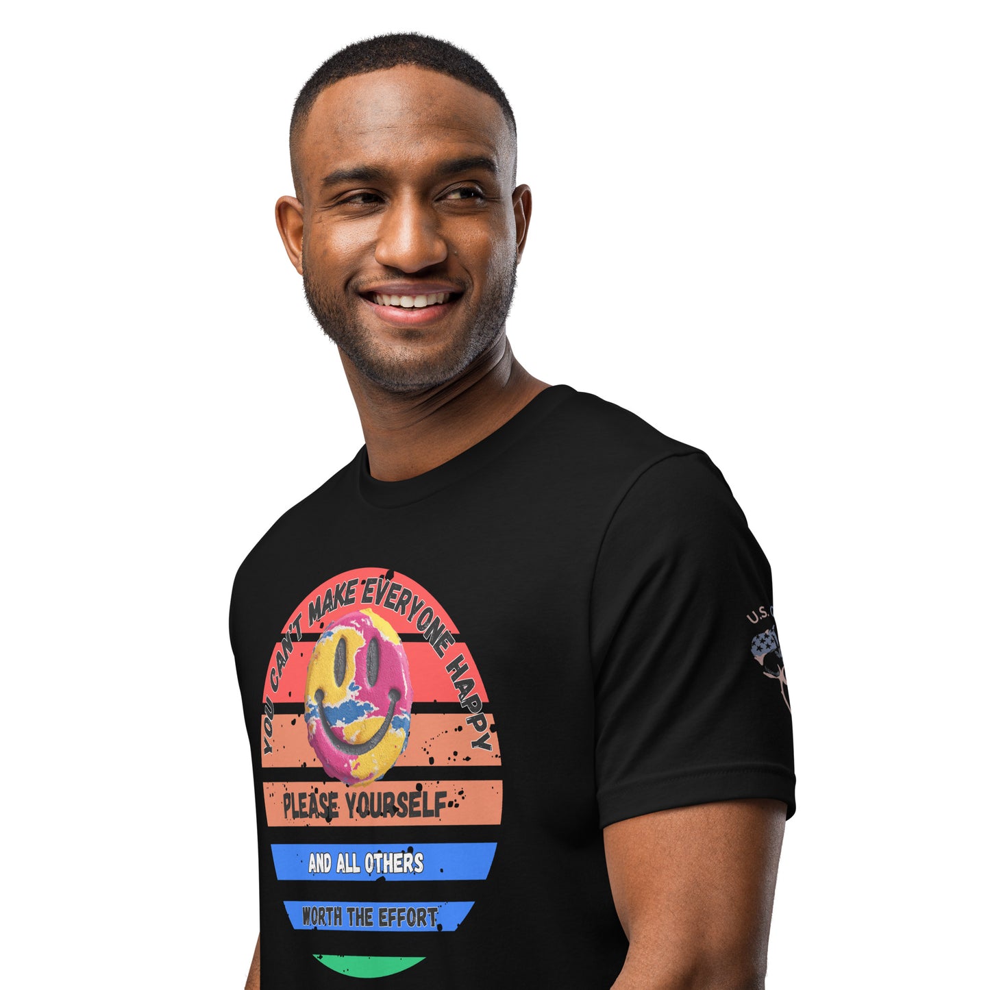 Product mockup. A man wears a black t-shirt showing a distressed rainbow smiley face within a circle and the text "You can't make everyone happy. Please yourself and all others worth the effort."