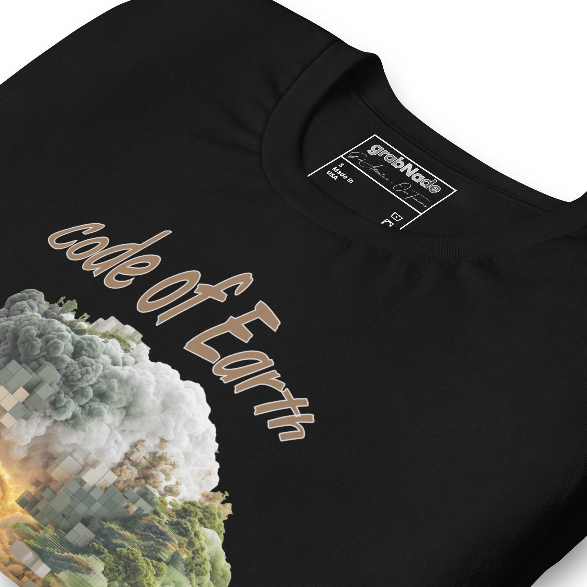 Product mockup. Close-up of a black t-shirt with "code of Earth" printed above a smoky pixelated forest motif.