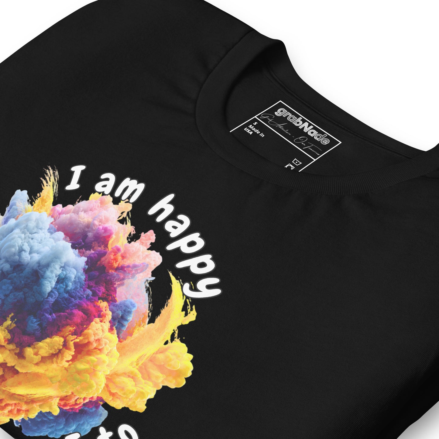 Product mockup. Close-up of a black t-shirt with the phrase "I am happy because I choose to" around a vibrant yellow, purple, and blue powdery burst.