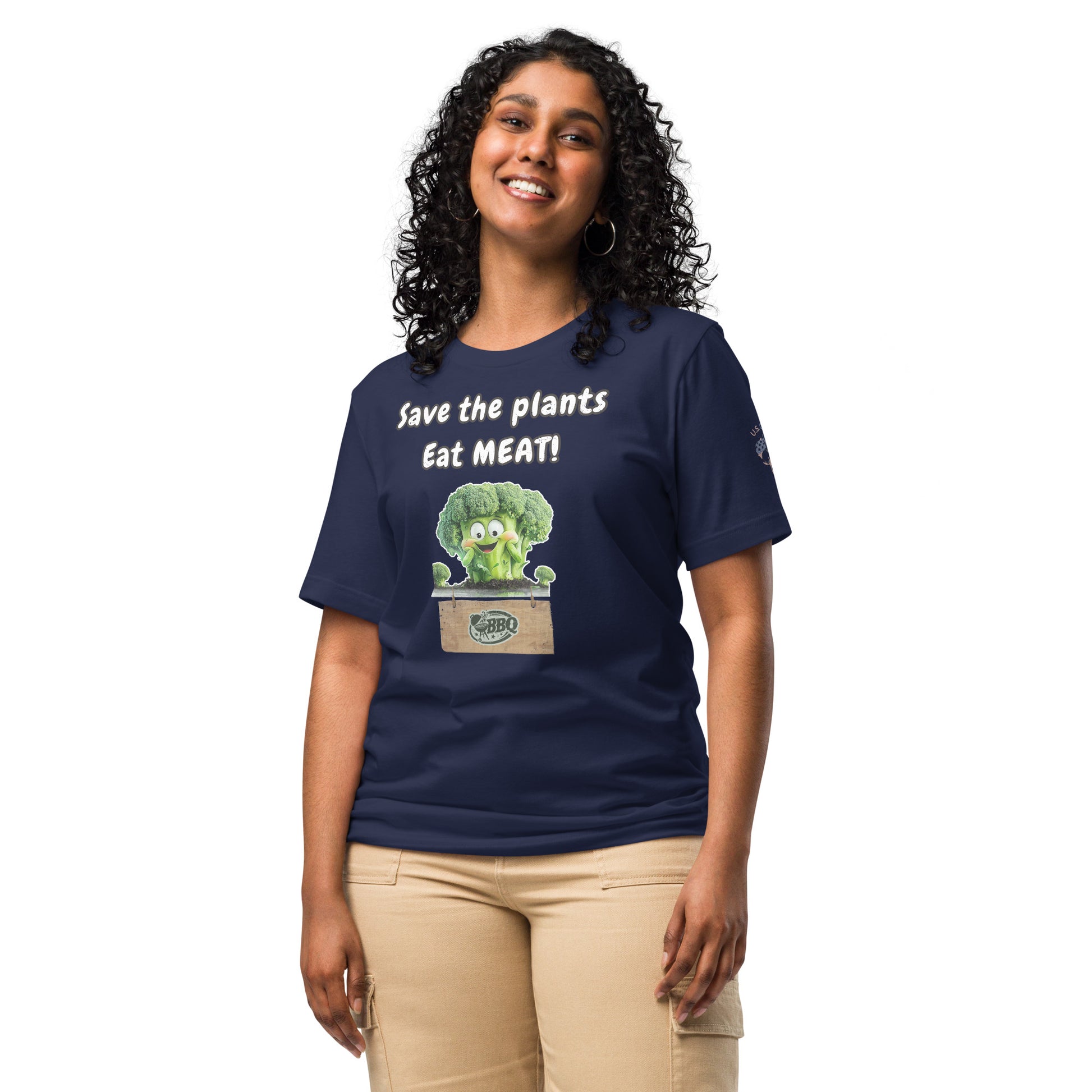 Product mockup. Smiling woman in a navy t-shirt with a happy broccoli and the phrase “Save the plants Eat MEAT!”
