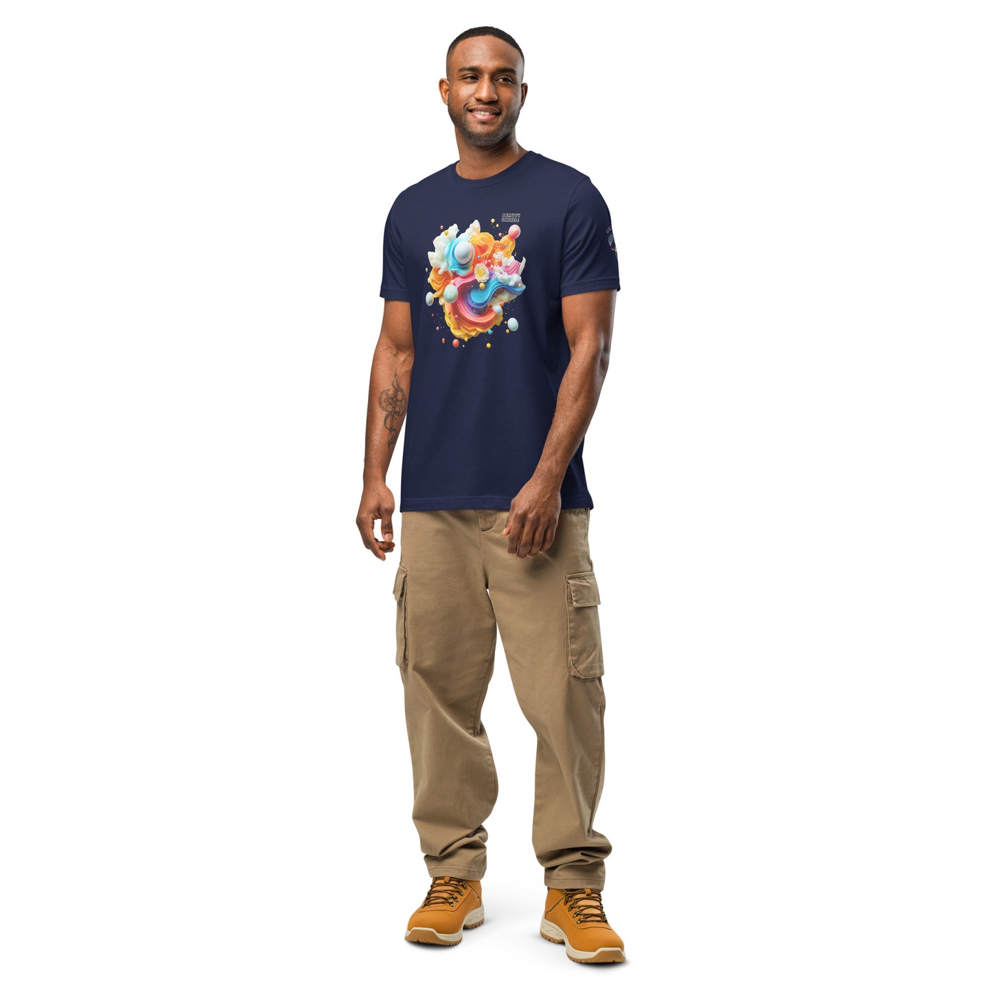 Product mockup. Smiling man in navy blue t-shirt and beige cargo pants with a stylized pastel 3D abstract pattern and bubbles, upper left says “Beauty Inside.”