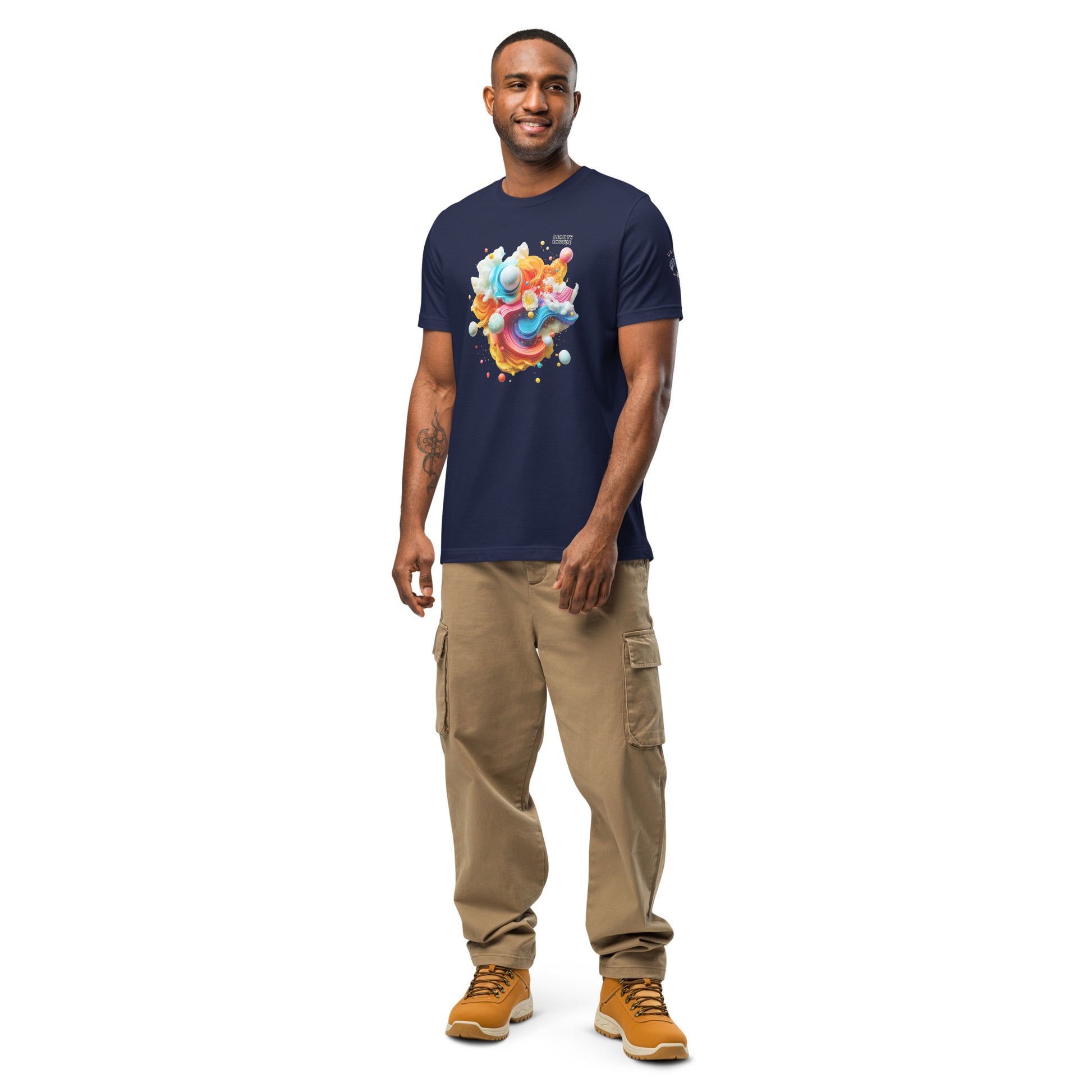 Product mockup. Smiling man in navy blue t-shirt and beige cargo pants with a stylized pastel 3D abstract pattern and bubbles, upper left says “Beauty Inside.”