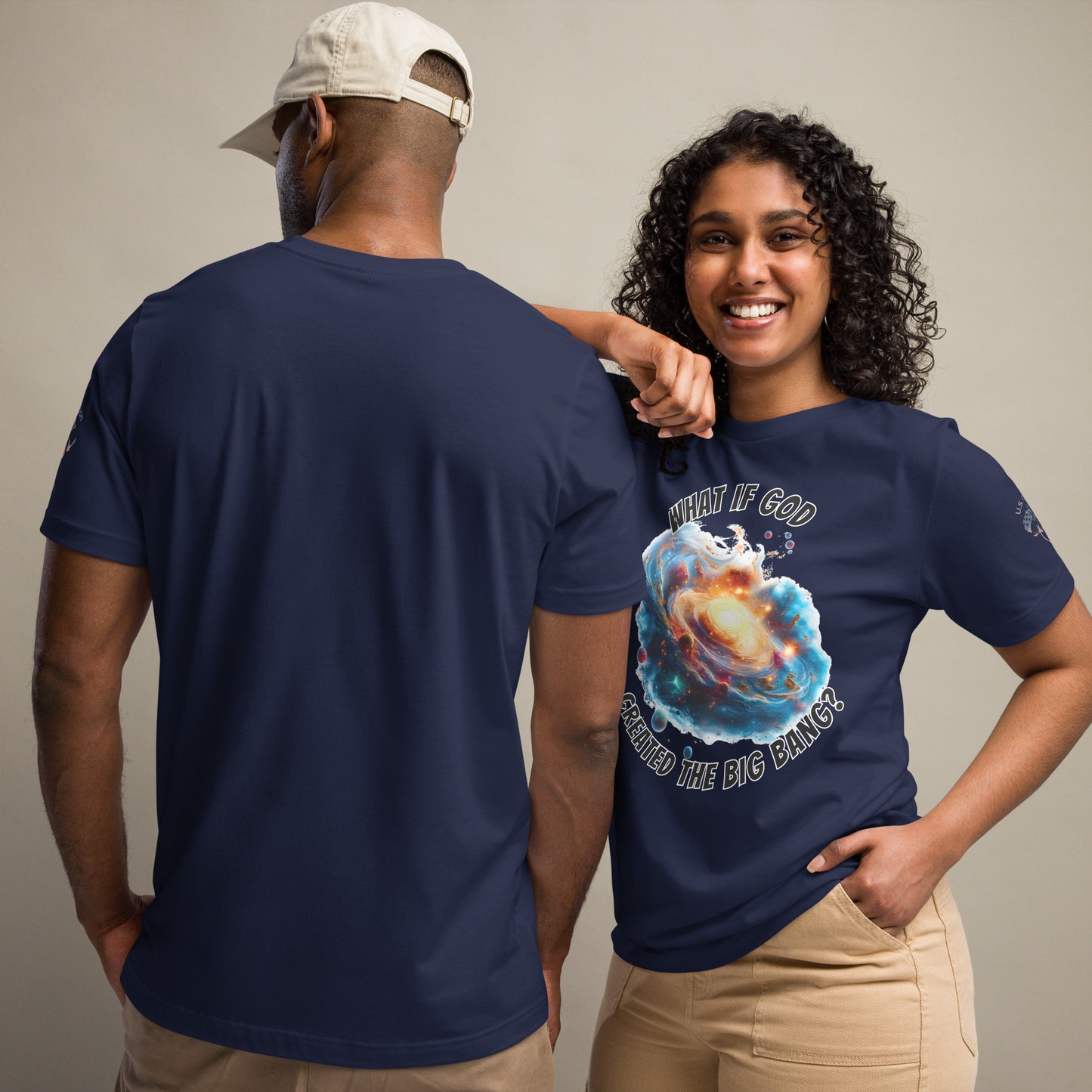 Product mockup. Man and woman; woman in navy blue T-shirt with "What if God created the big bang?" design, man in plain navy blue shirt back view.