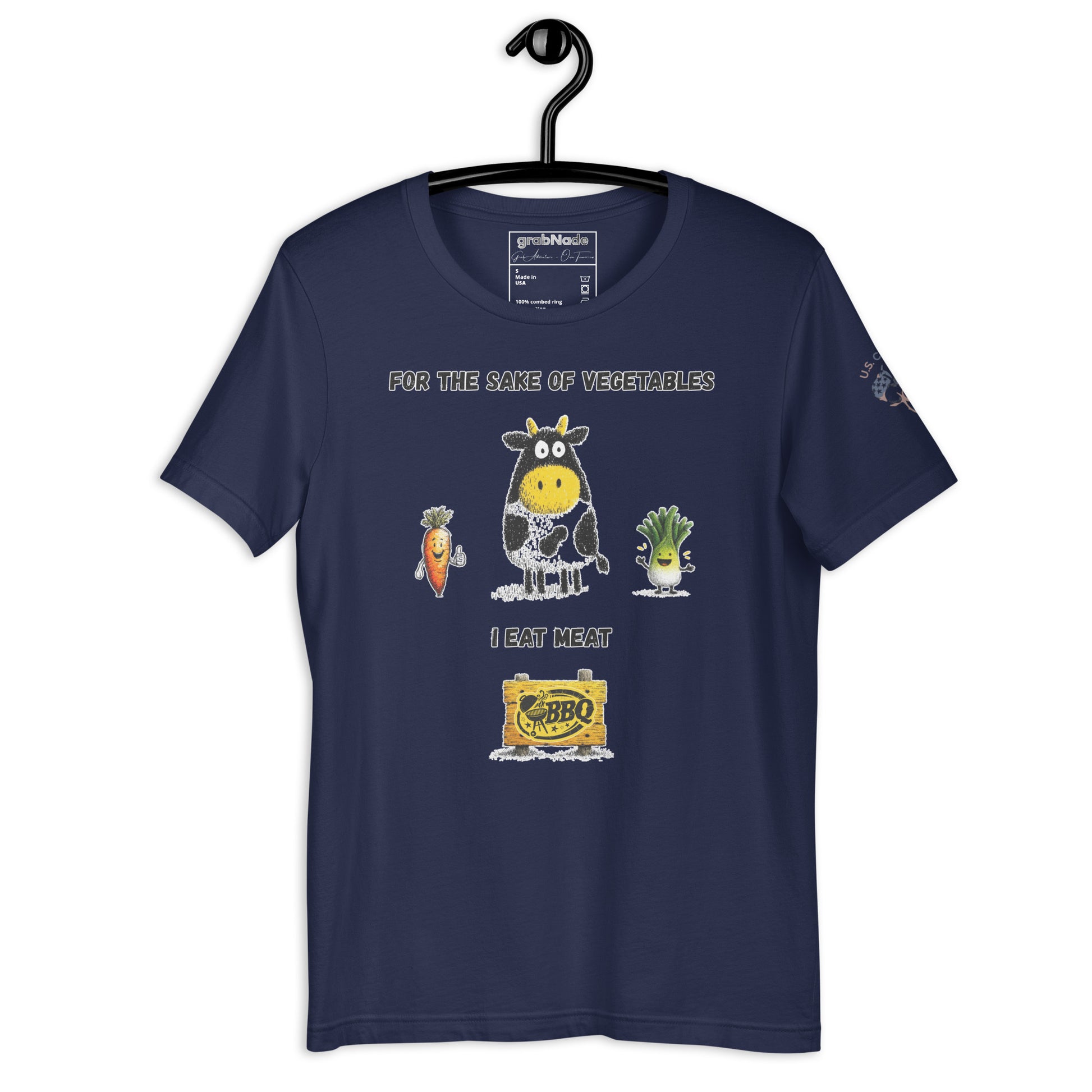 Product mockup. Navy blue t-shirt on a hanger, decorated with a cartoon cow, carrots, lettuce, and BBQ sign, phrase: “FOR THE SAKE OF VEGETABLES I EAT MEAT”.