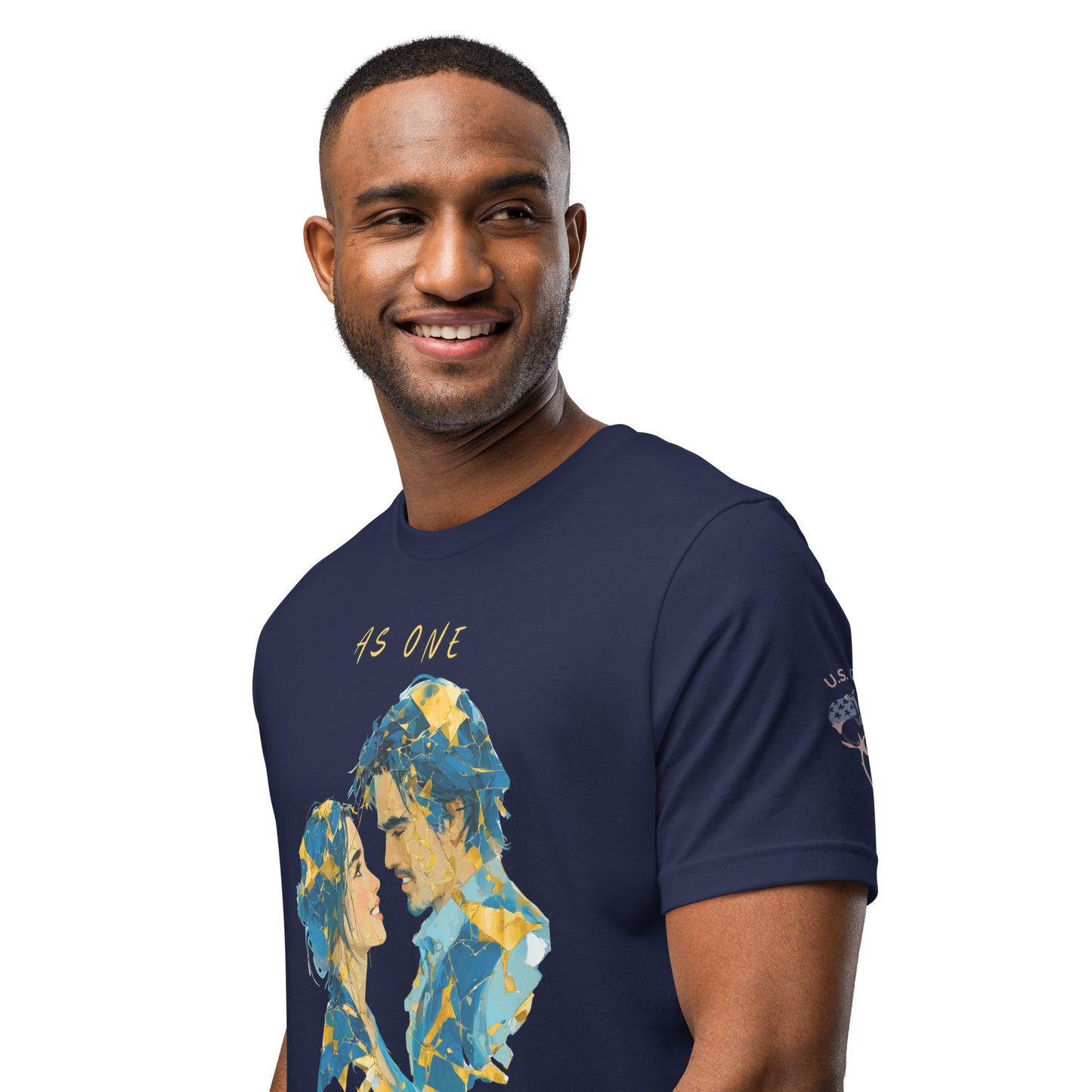 Product mockup. Smiling man wearing a navy blue T-shirt featuring a large abstract blue and gold couple's portrait with "AS ONE" above.