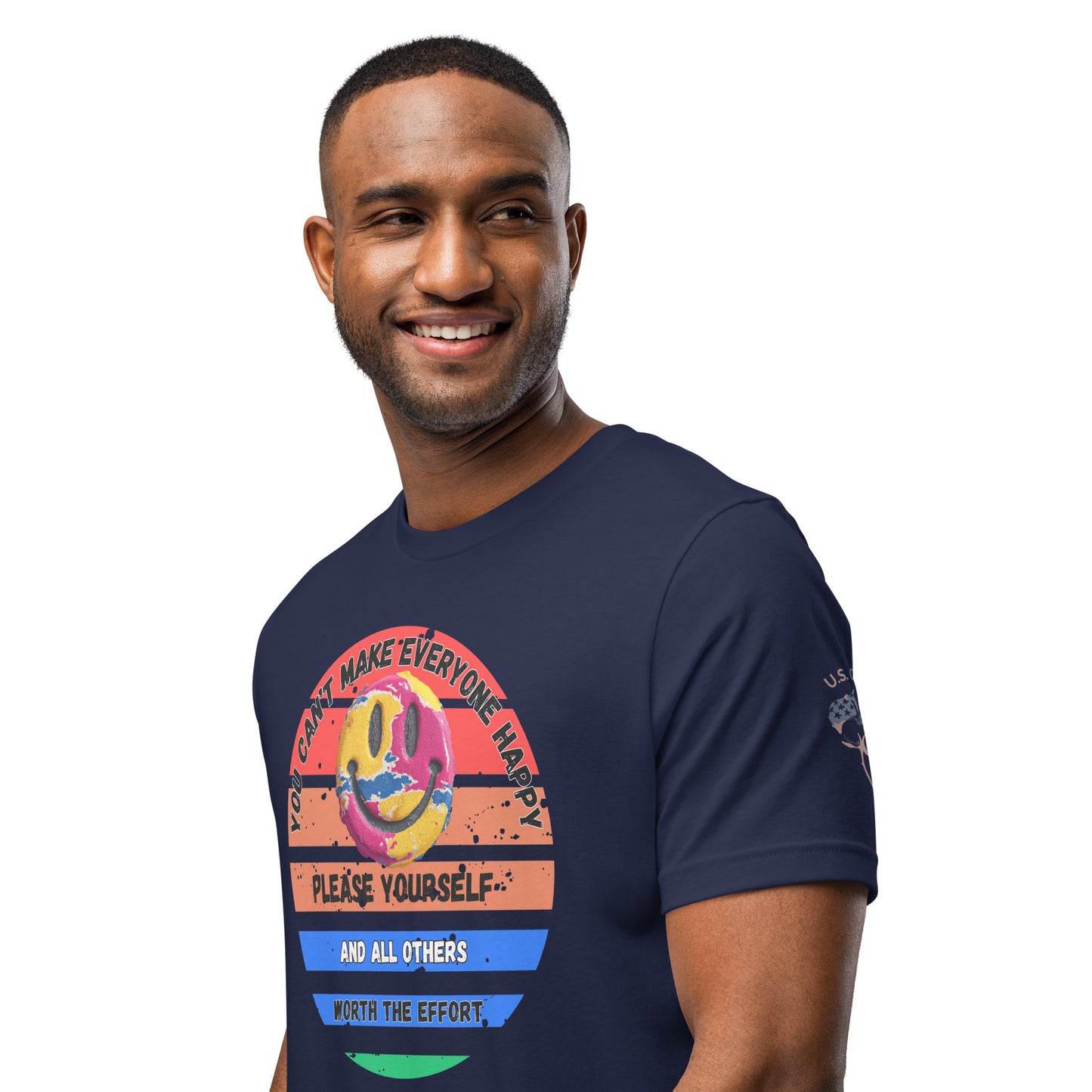 Product mockup. A man wears a navy blue t-shirt showing a distressed rainbow smiley face within a circle and the text "You can't make everyone happy. Please yourself and all others worth the effort."