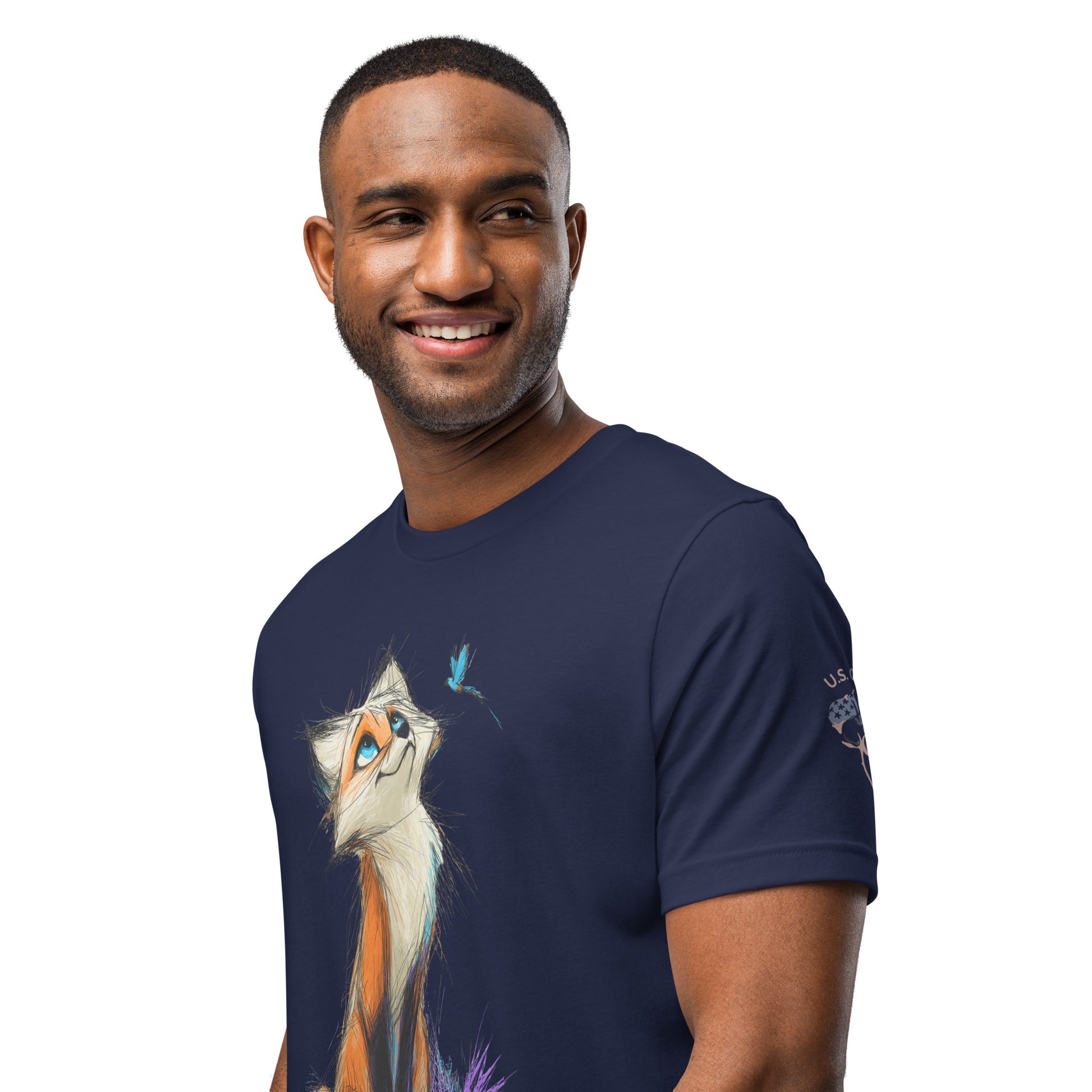 Product mockup. Smiling woman standing, wearing a navy blue T-shirt with a large illustrated orange fox and blue butterfly graphic.