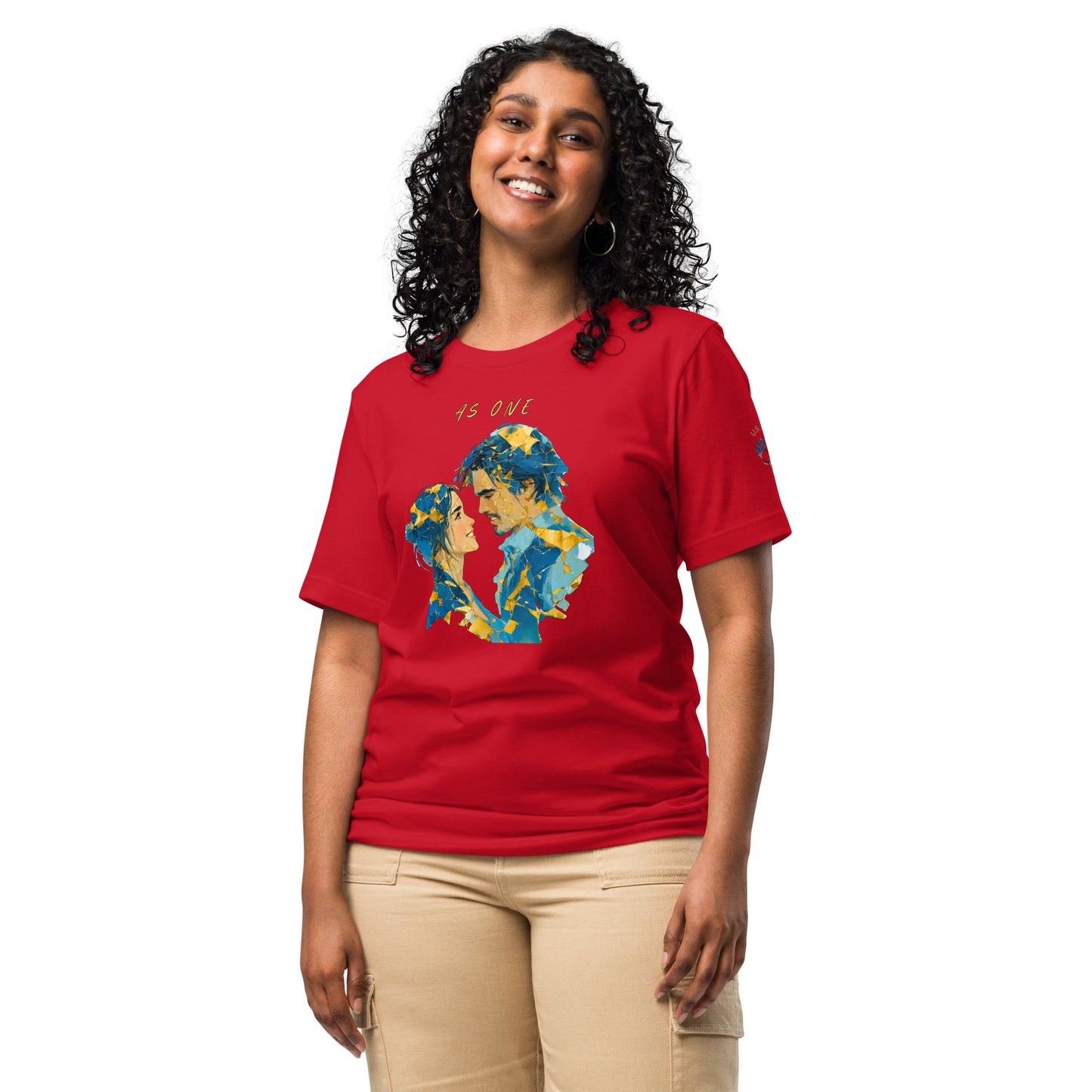 Product mockup. Woman wearing a red T-shirt with yellow/blue cubist-style couple face to face, "AS ONE" above illustration.