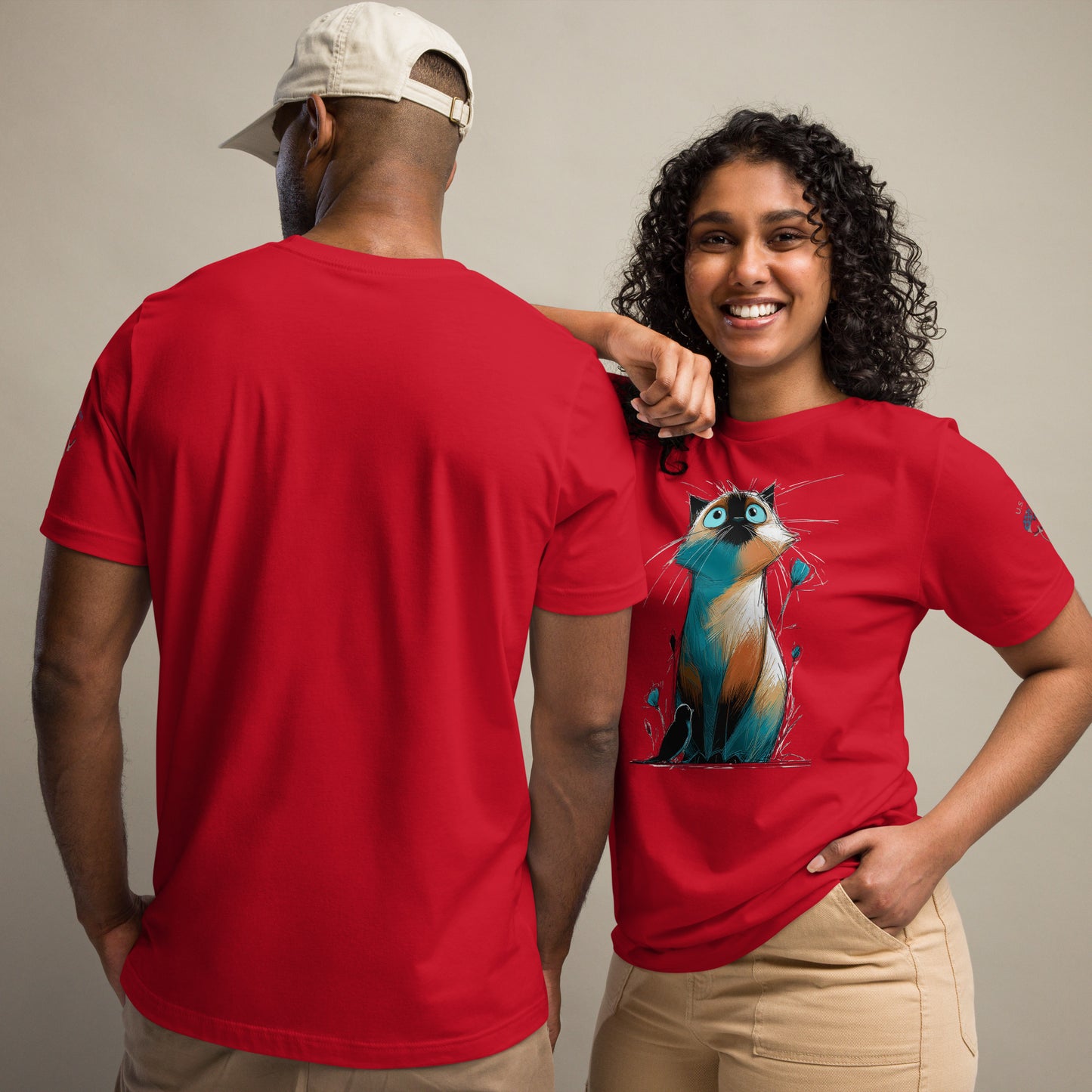 Product mockup. Woman in red T-shirt with crocodile illustration in shades of blue, orange, and yellow plants.