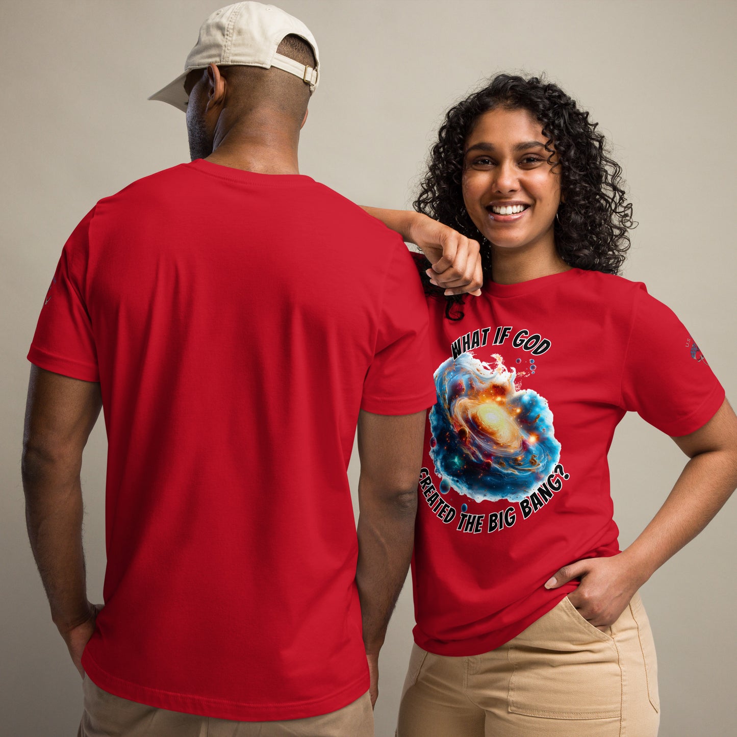 Product mockup. Man and woman; woman in red T-shirt with "What if God created the big bang?" design, man in plain red shirt back view.