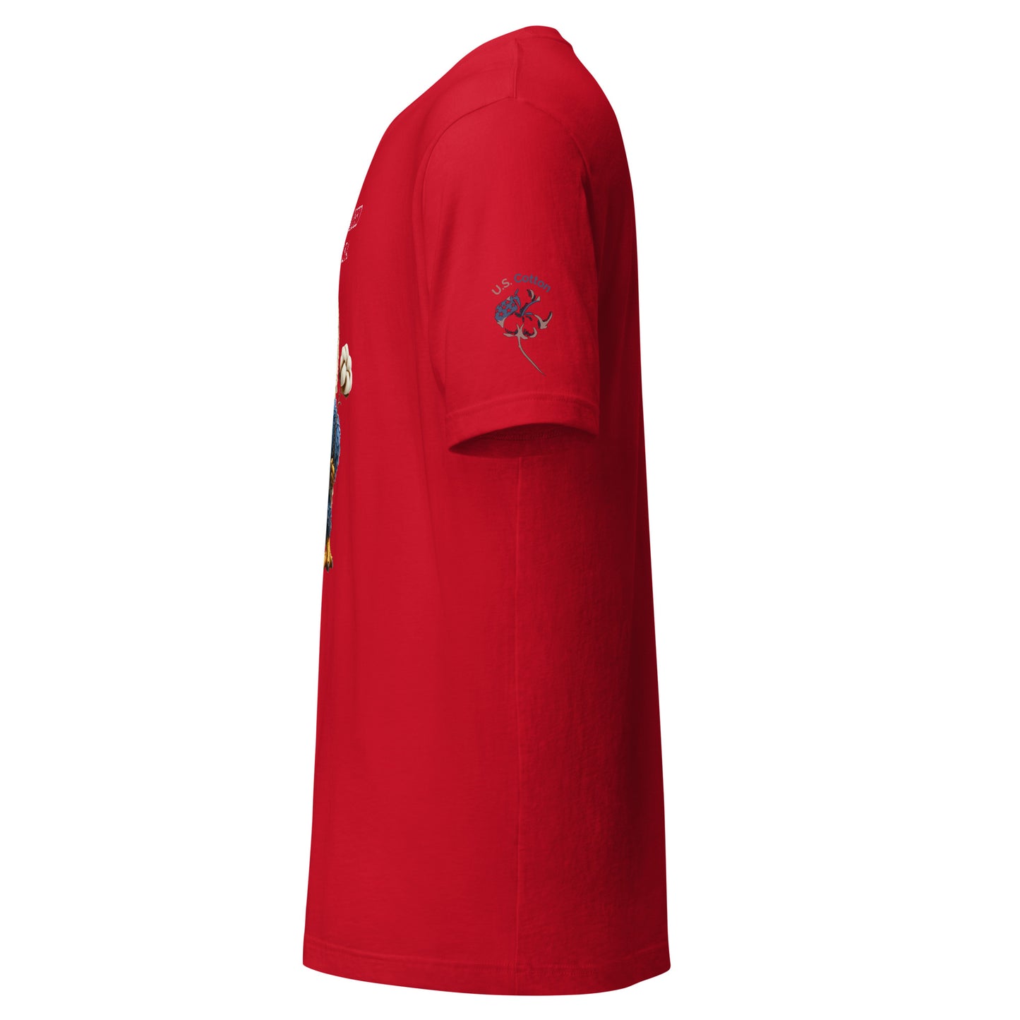 Product mockup. A red short-sleeve T-shirt is shown from a right-side angle. The shirt features a small "U.S. Cotton" logo and a cotton flower graphic printed on the outer side of the right sleeve. The front of the shirt displays part of a decorative, likely colorful design, though the full graphic is partially obscured from this side view. The fabric appears smooth and the shirt has a classic fit sleeve and hem.
