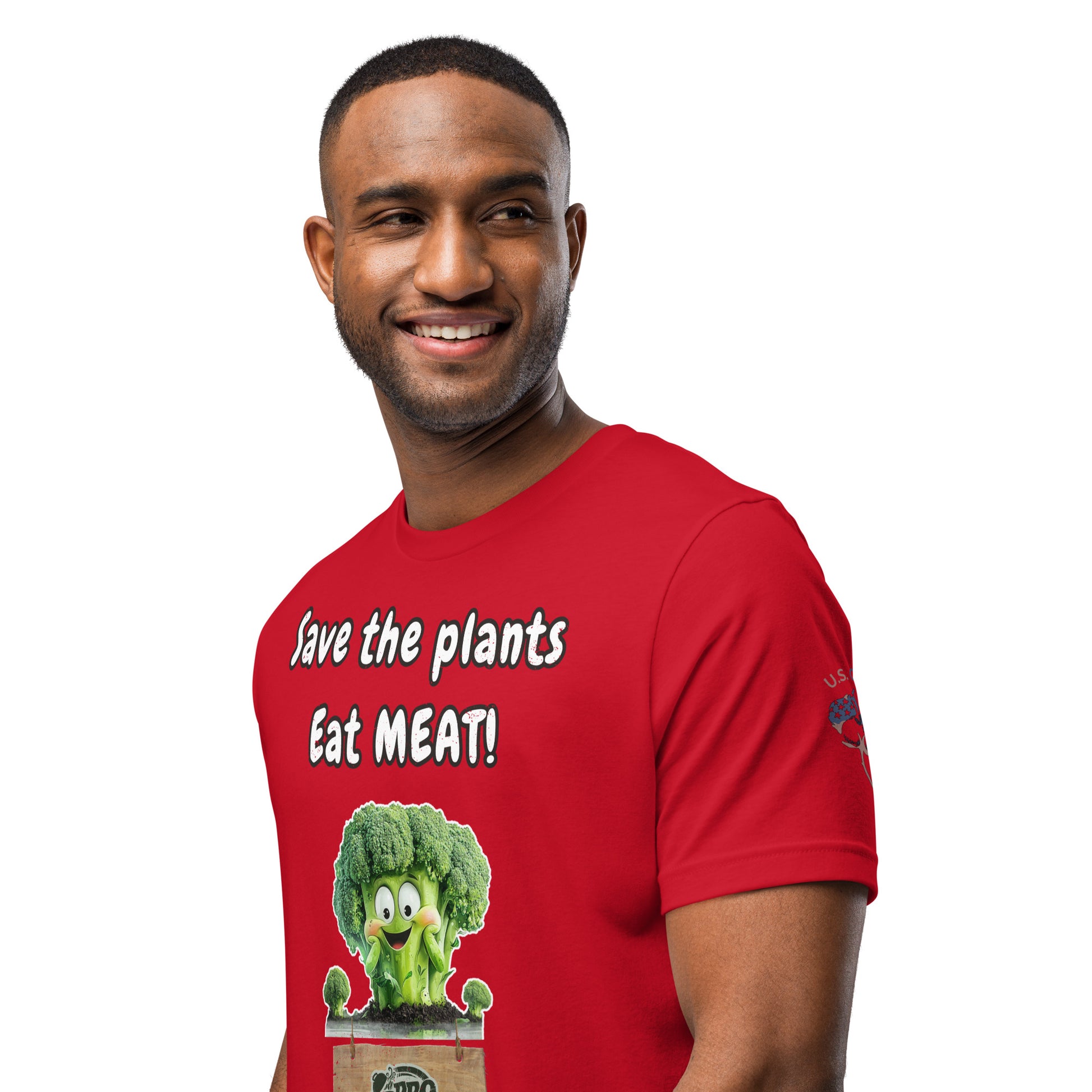 Product mockup. Man close-up, wearing red T-shirt, "Save the plants Eat MEAT!" humor broccoli art, sleeve has U.S. Cotton logo.