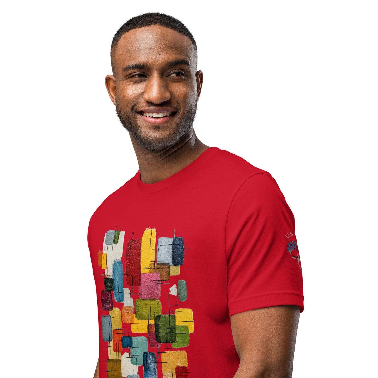Product mockup. Man close-up, red T-shirt, abstract colorful block print on chest, sleeve U.S. Cotton logo.
