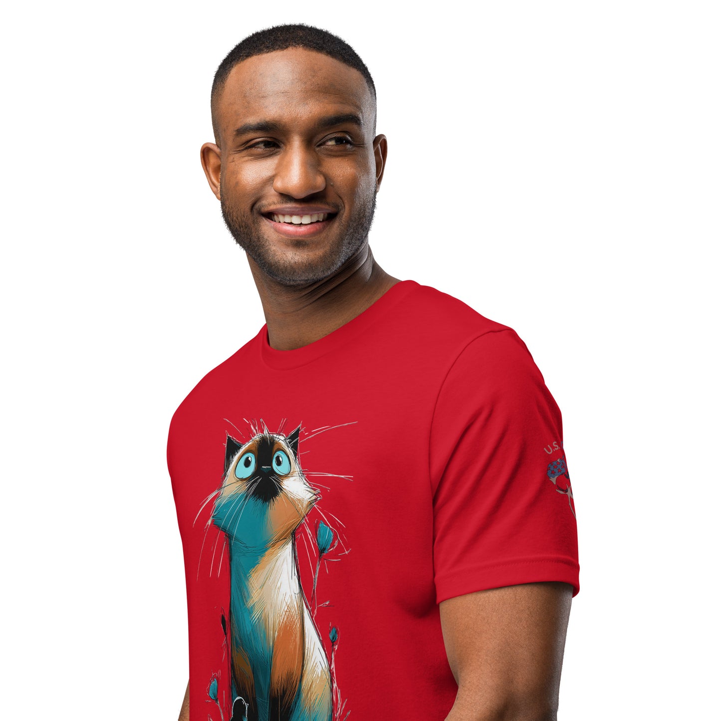 Product mockup. A man modeling a red T-shirt featuring a big cartoon cat with blue eyes and multicolored fur, illustrated on the shirt front.