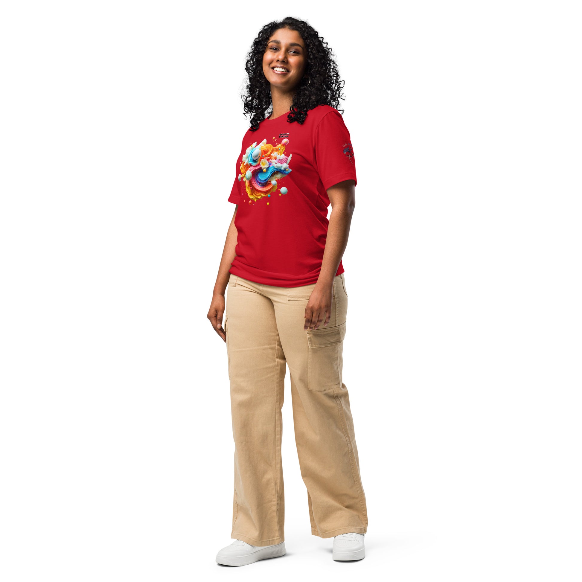Product mockup. A woman wearing beige cargo pants and a red T-shirt with a colorful, swirling abstract artwork of planets and liquid shapes, in a full-body pose.