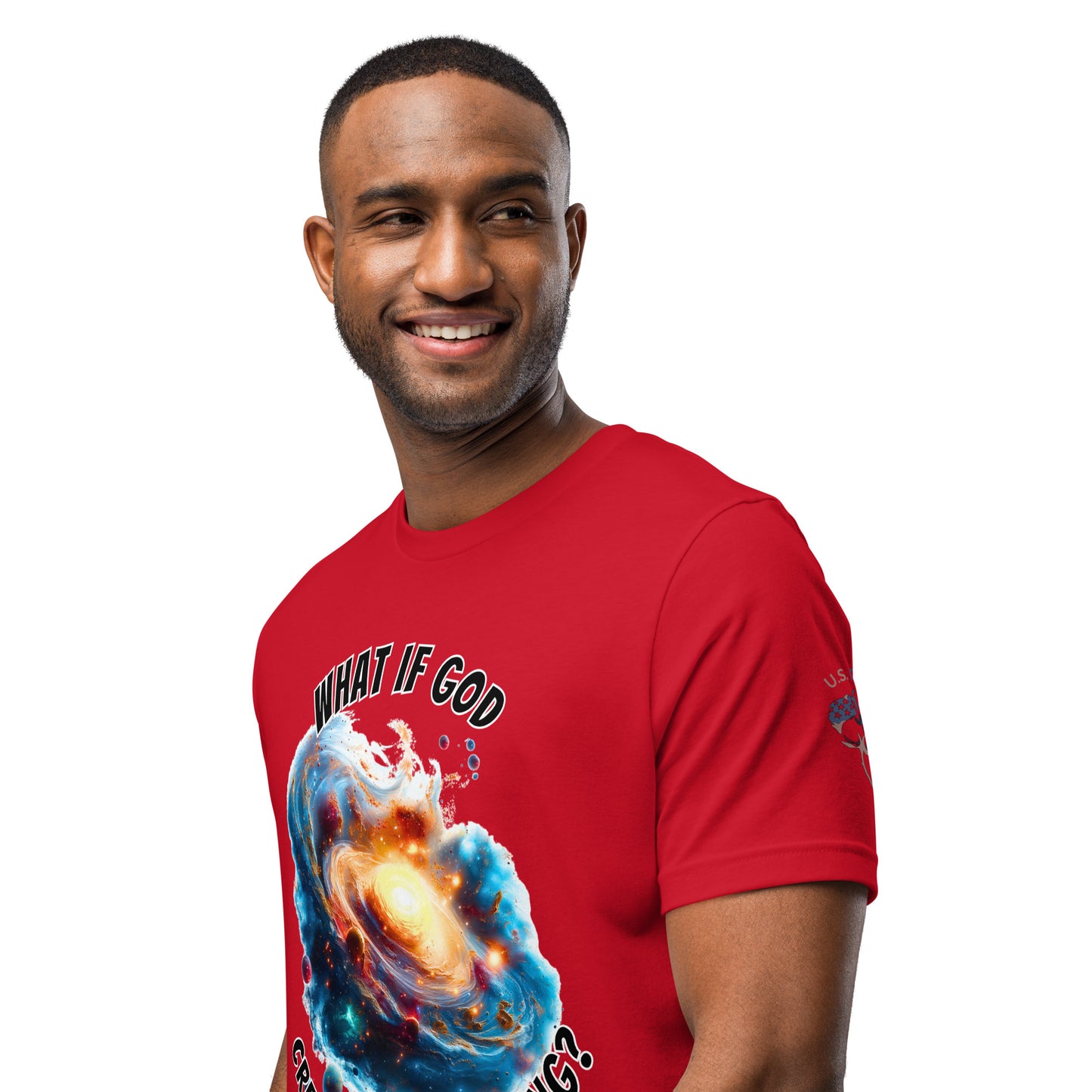 Product mockup. A man modeling a red T-shirt with a vivid galaxy and nebula illustration, featuring the text “WHAT IF GOD CREATED THE BIG BANG?” in bold letters.