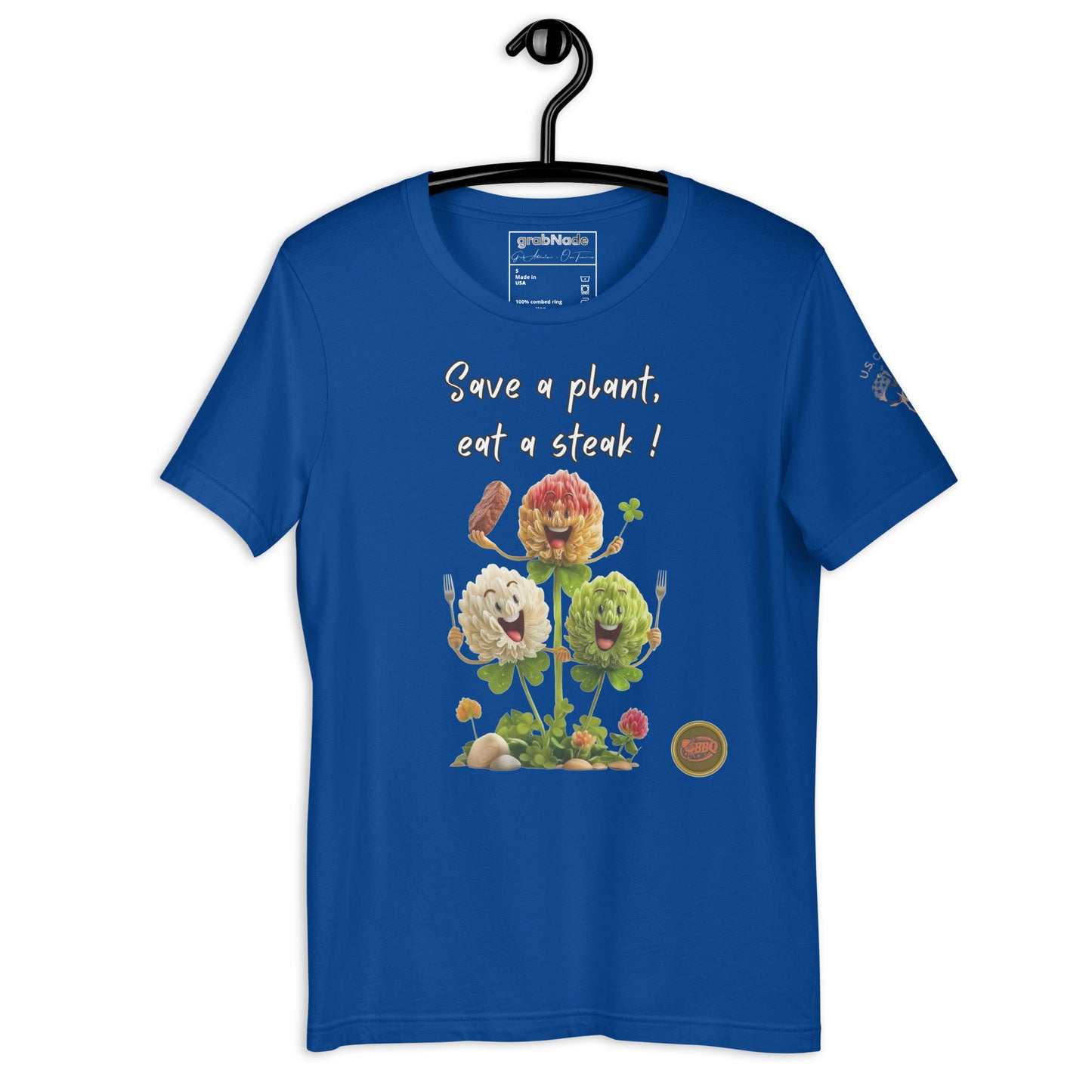 Product mockup. A man in tan cargo pants and boots wearing a royal blue T-shirt decorated with three large cartoon flowers and the words “Save a plant, eat a steak!”